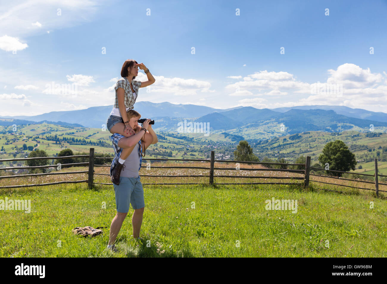 Happy man woman hiking mountains hi-res stock photography and images ...