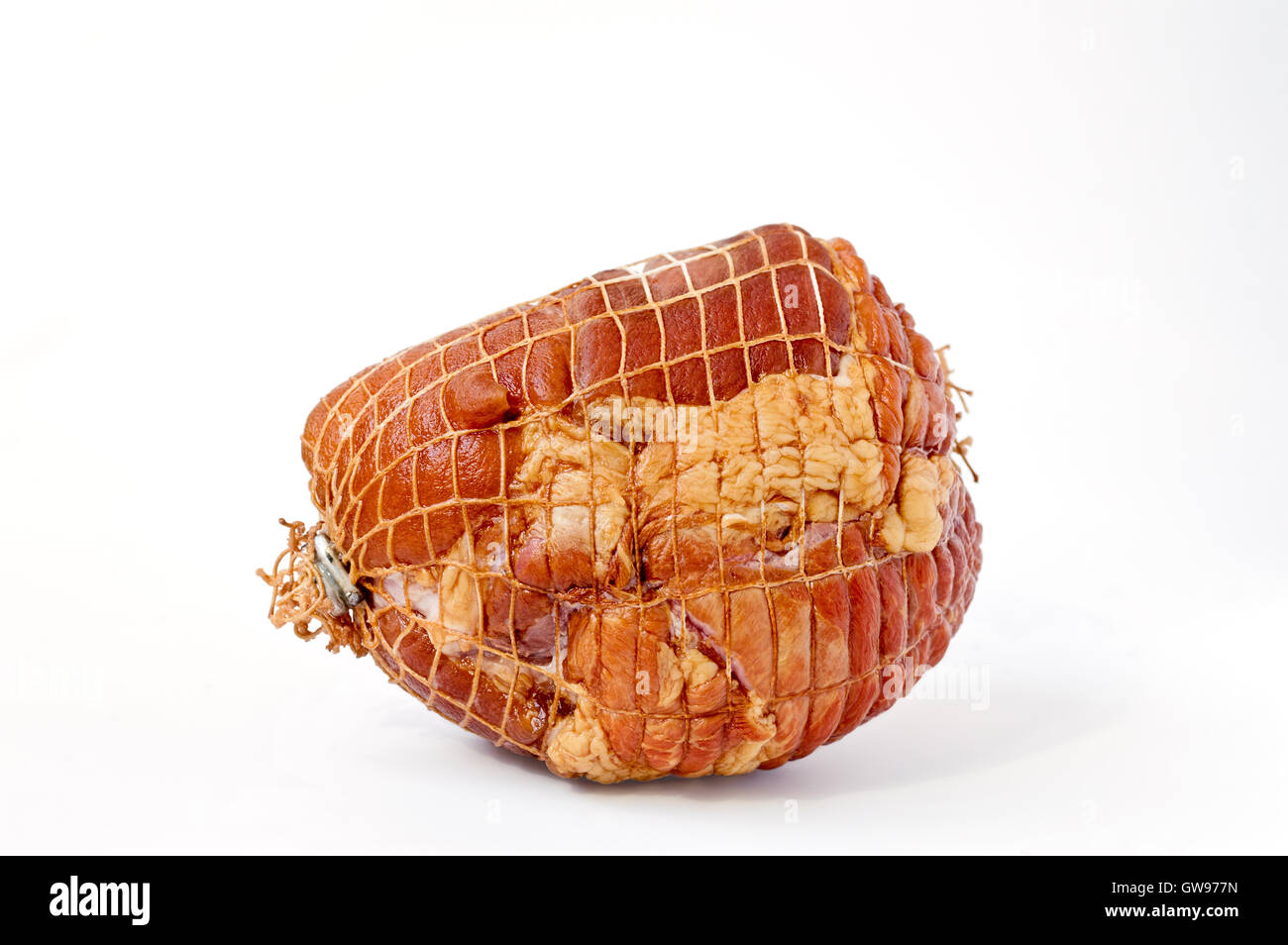 Smoked boneless pork ham hock wrapped in netting isolated on white Stock Photo