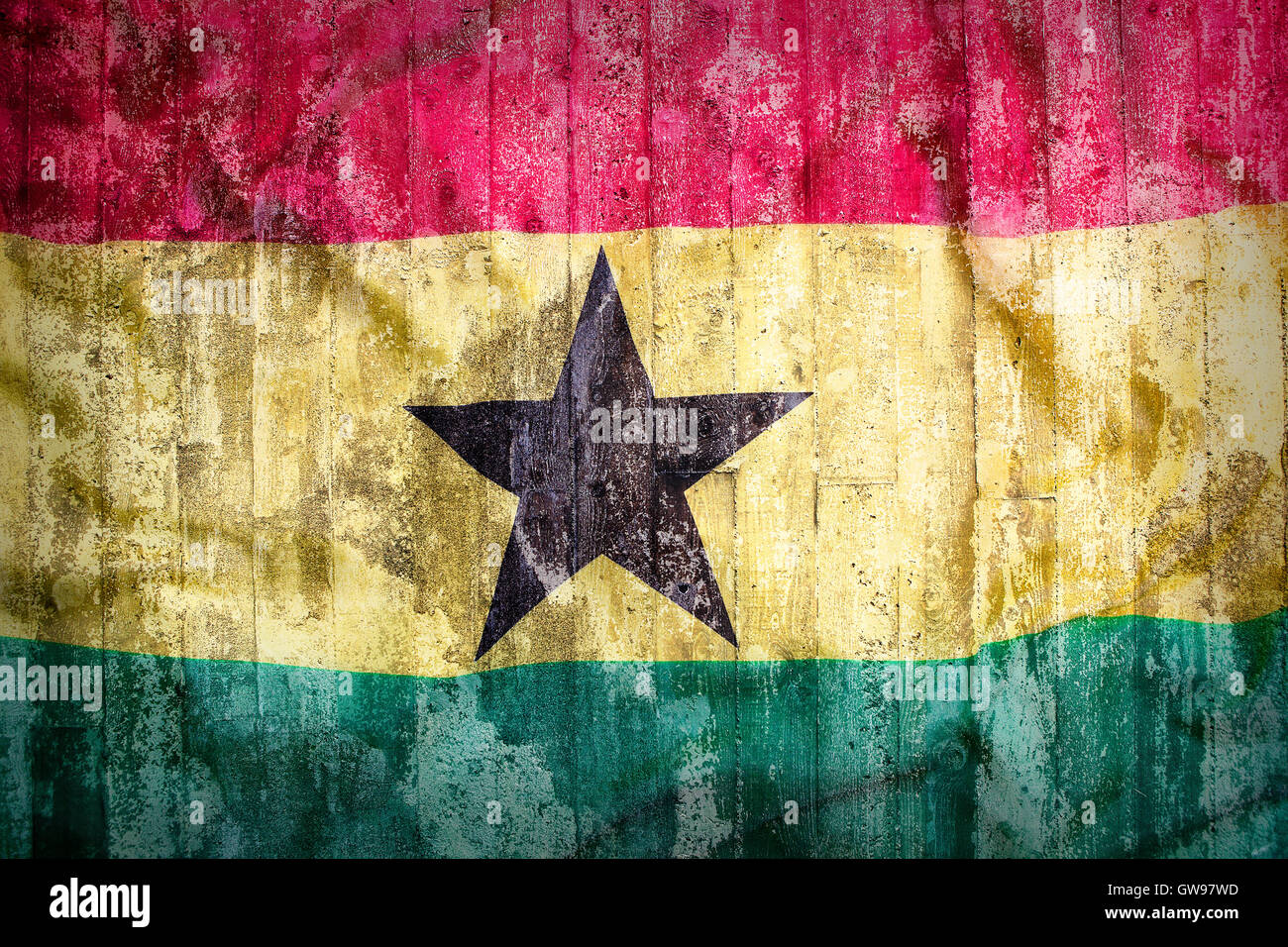 Grunge style of Ghana flag on a brick wall for background Stock Photo