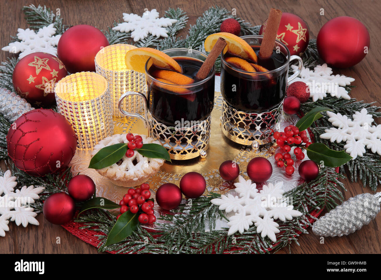 Christmas party food and drink with mulled wine and mince pie, bauble