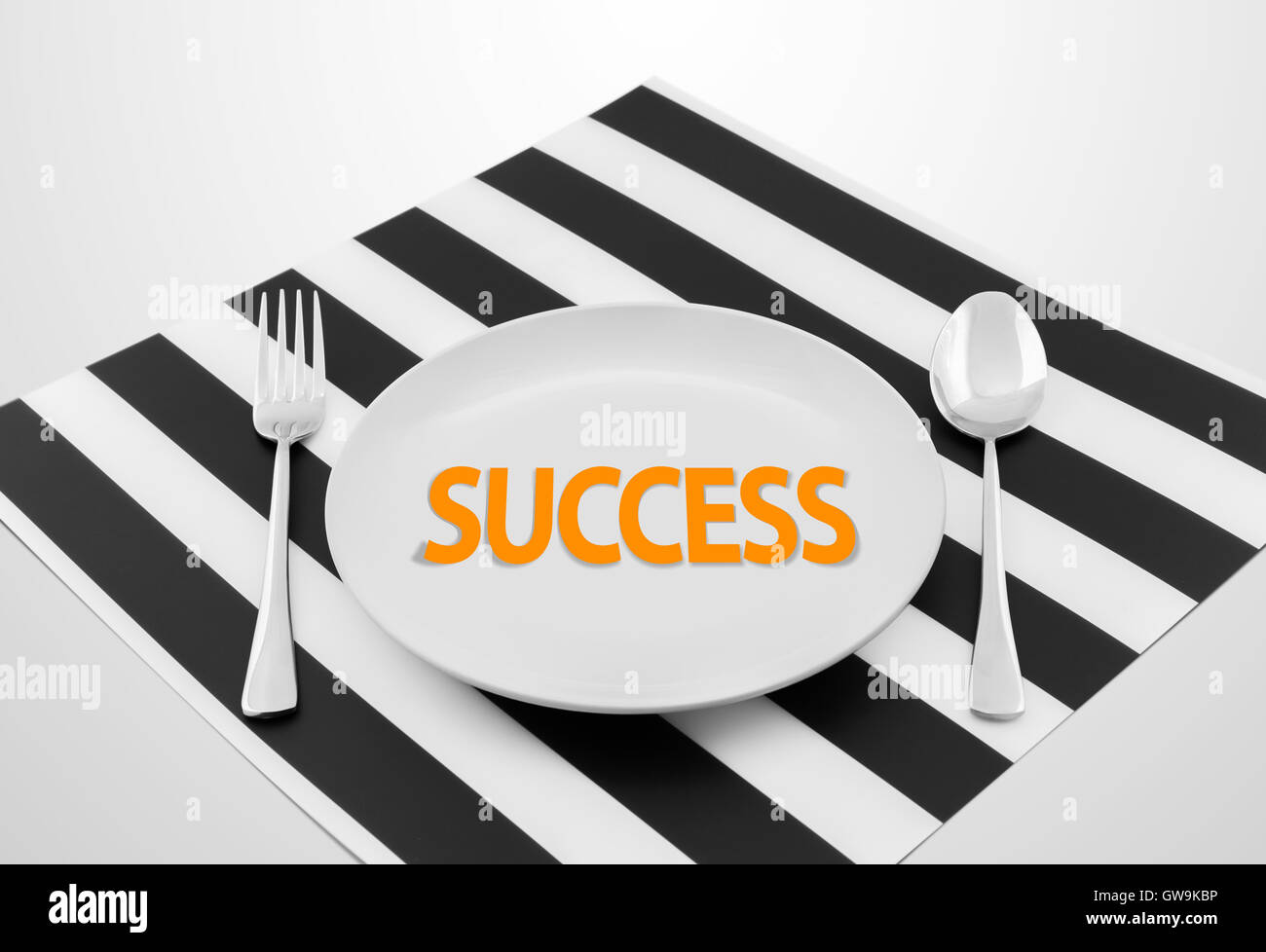 Successful concept on ready to serve dish with spoon and fork