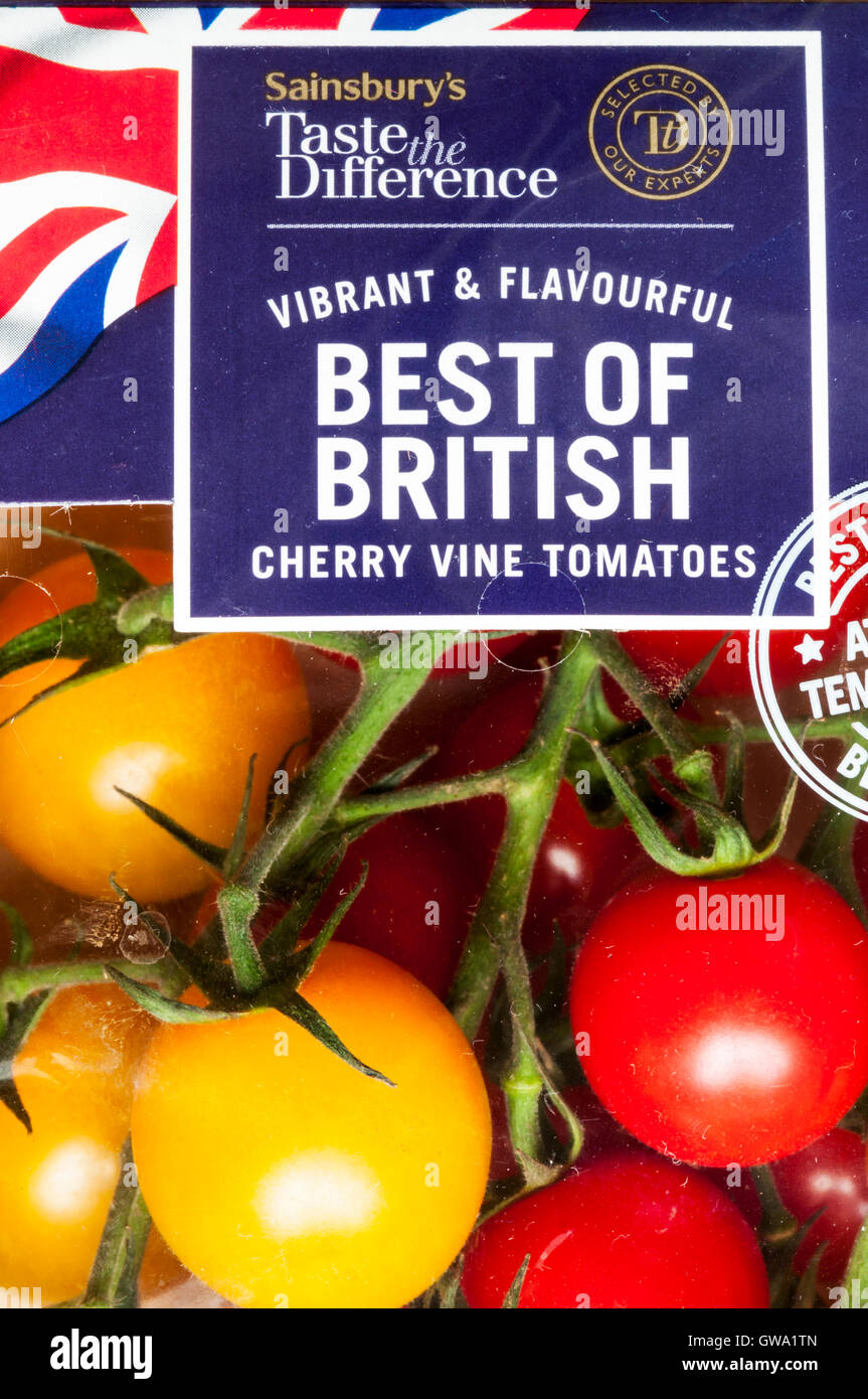 Sainsbury's Taste the Difference Best of British red Vittoria cherry vine tomatoes and yellow cherry tomatoes. Stock Photo