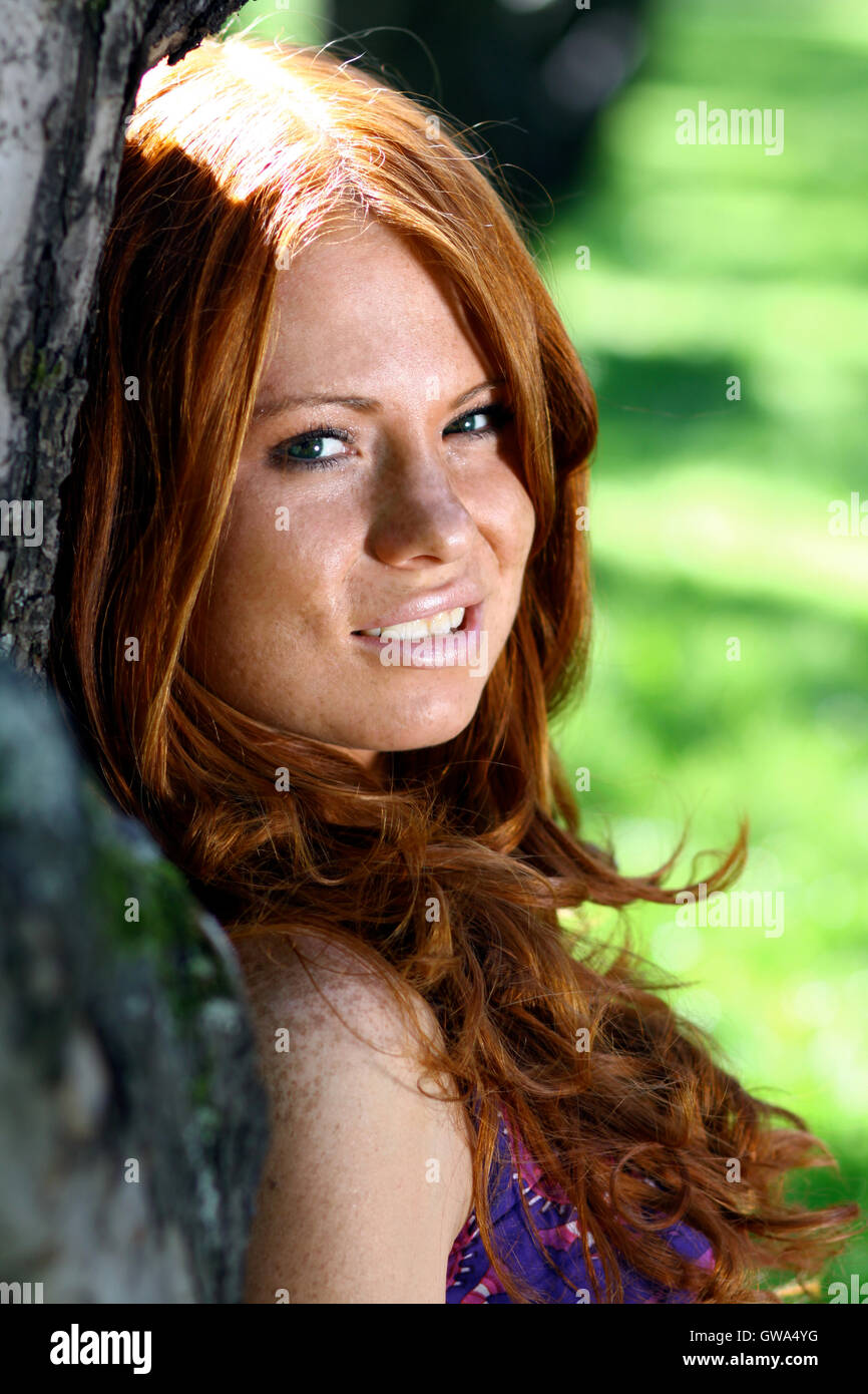 Portrait of red-haired beautiful young woman Stock Photo - Alamy