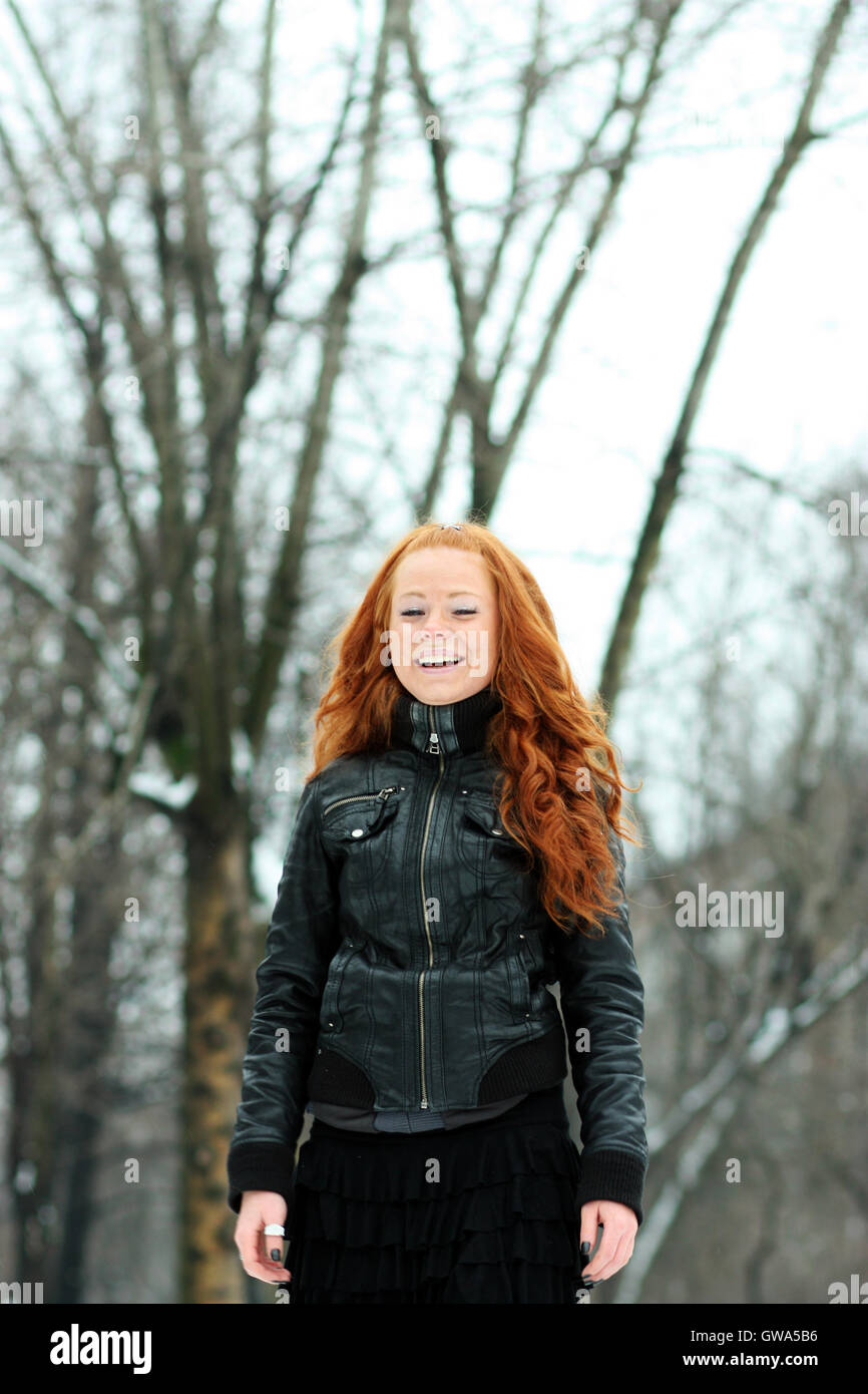 Winter woman in rest snow park Stock Photo