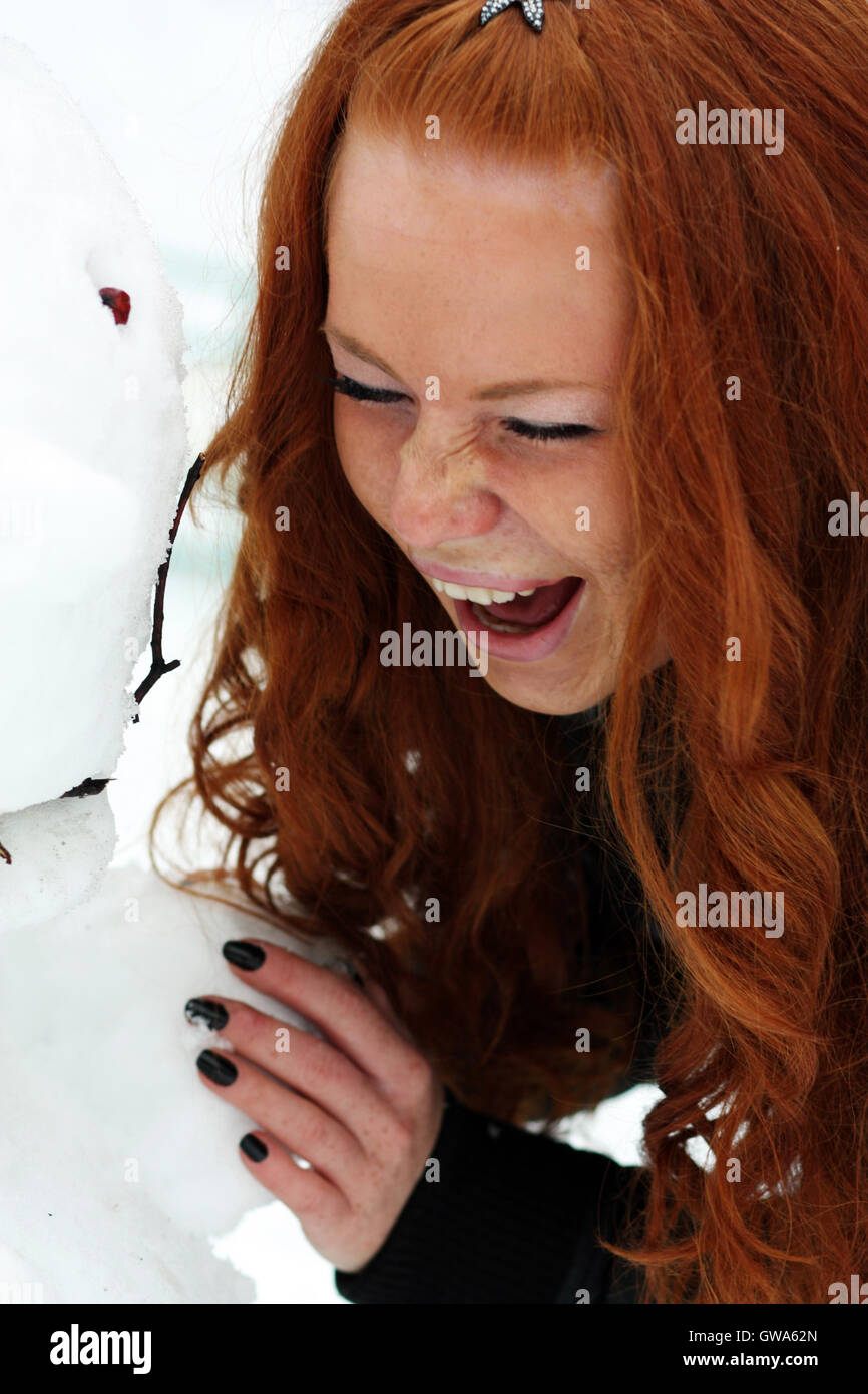 Winter woman in rest snow park Stock Photo