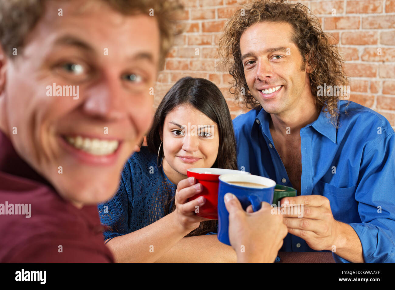 Friends Toasting with Coffee Stock Photo Alamy