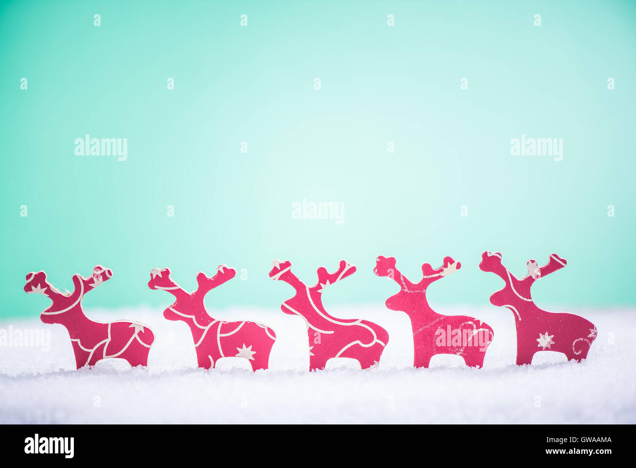 wooden vintage reindeers , Christmas card background Stock Photo - Alamy