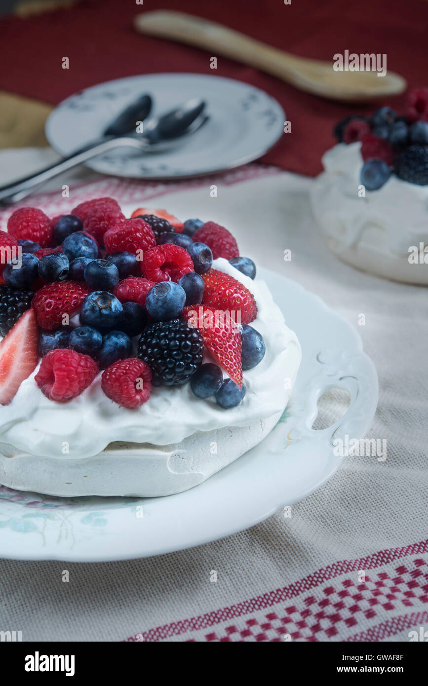 Pavlova with mixed berries Stock Photo