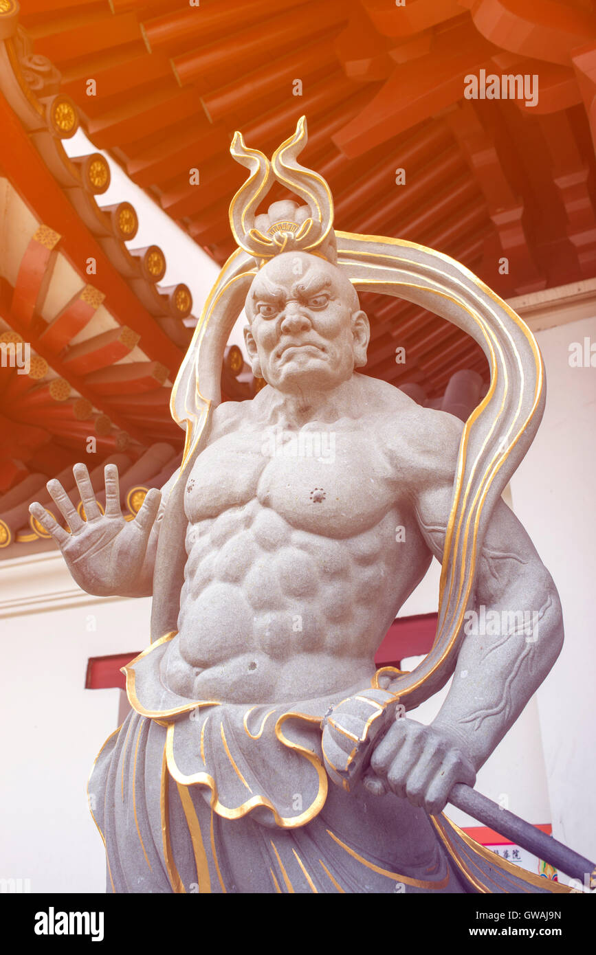 guard demon statue from Buddha Tooth Relic Temple in Singapore Stock Photo
