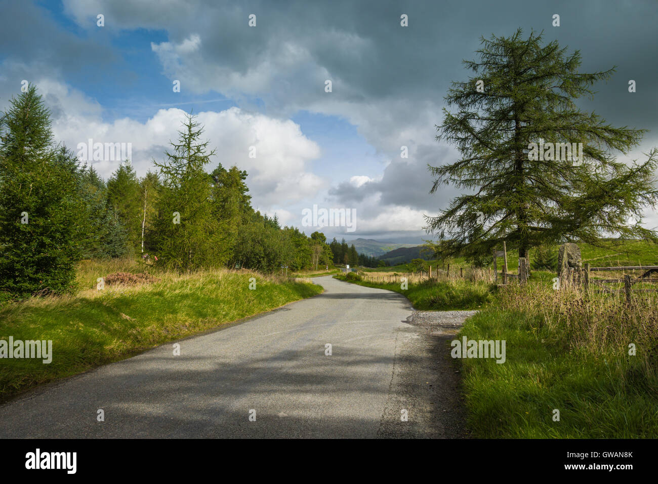 Rural road in the English Lake District, Cumbria, UK. Stock Photo