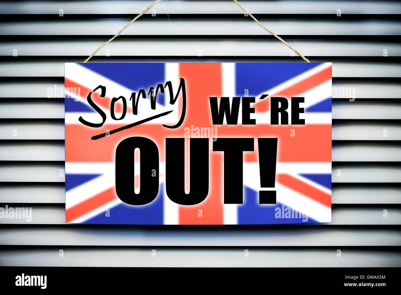 'Sign ''Sorry we ?, ?'re out'' with flag of Great Britain, symbolic photo Brexit', Schild 'Sorry weÂ´re out' mit Fahne von Gross Stock Photo