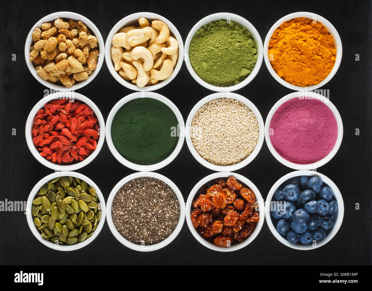 Superfoods collection on chalkboard as background Stock Photo - Alamy
