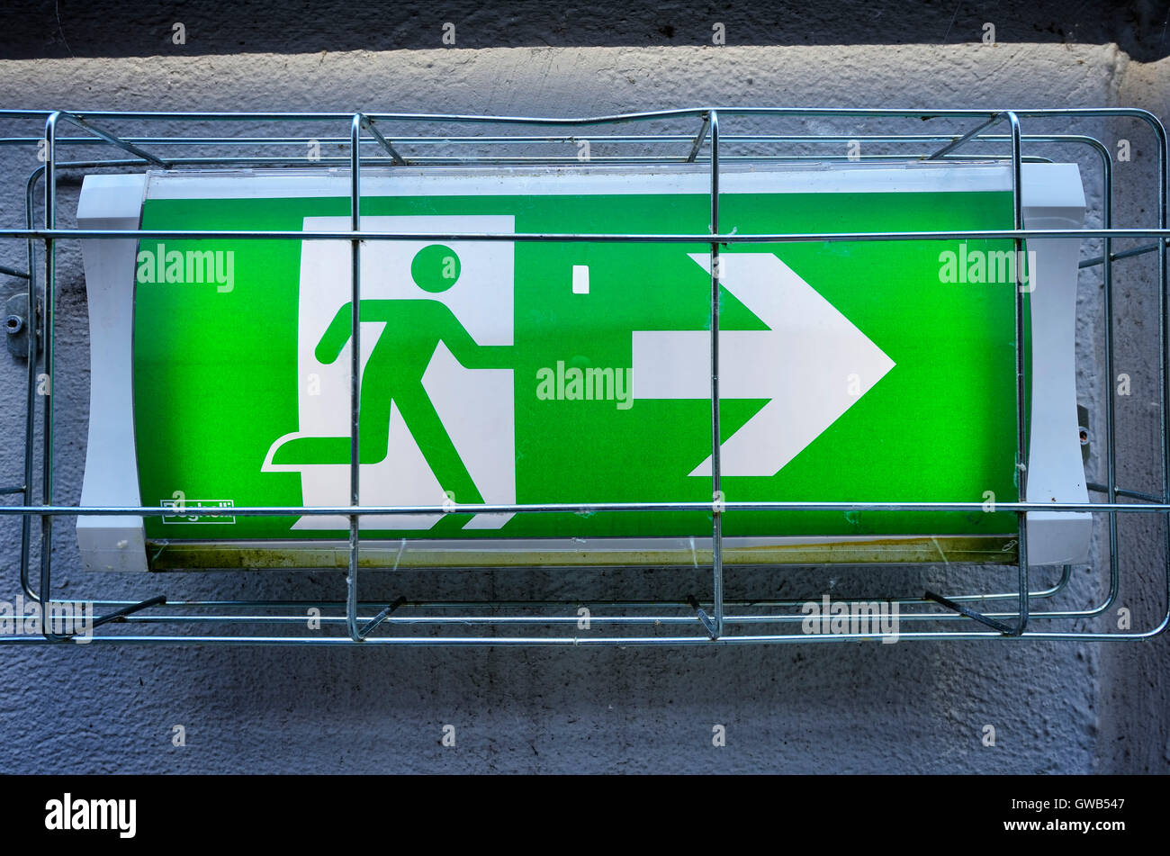 Signpost emergency exit, Wegweiser Notausgang Stock Photo