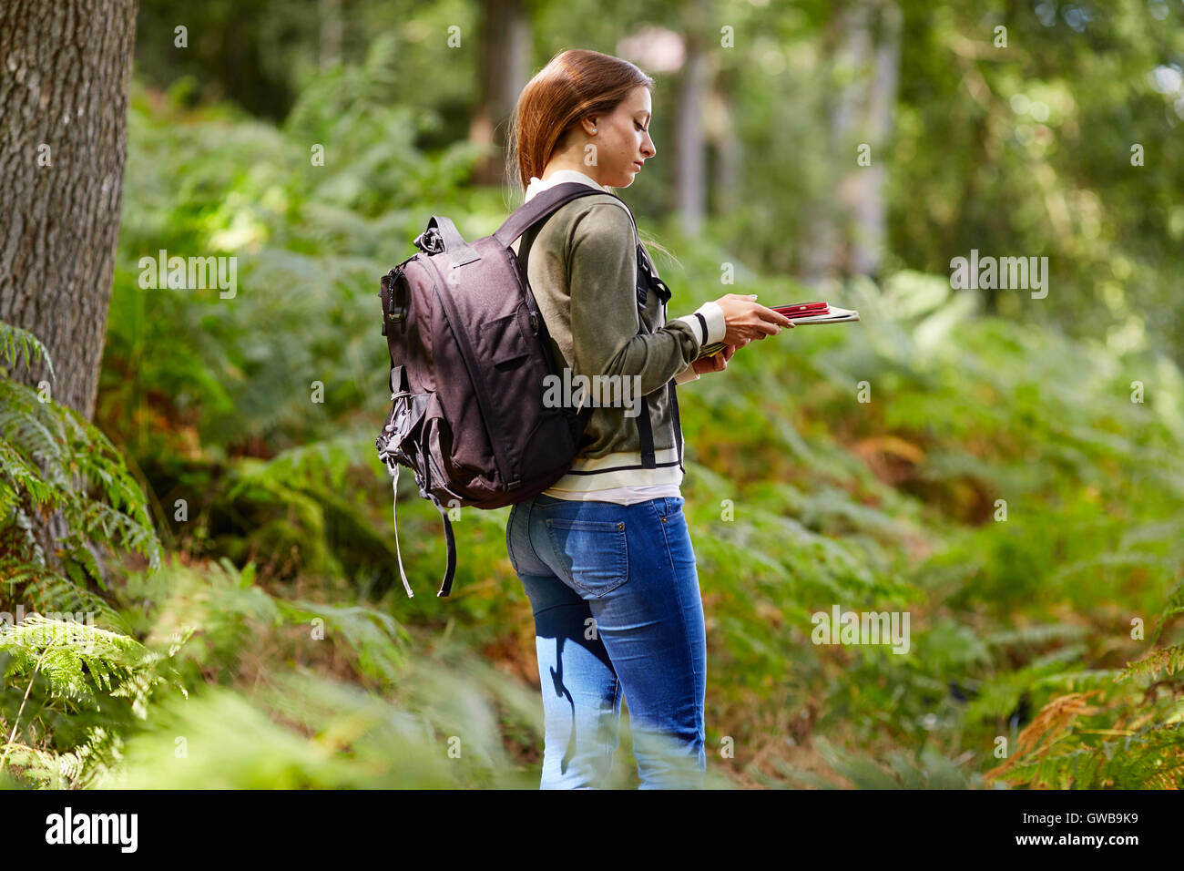 Woman walking in countryside Stock Photo