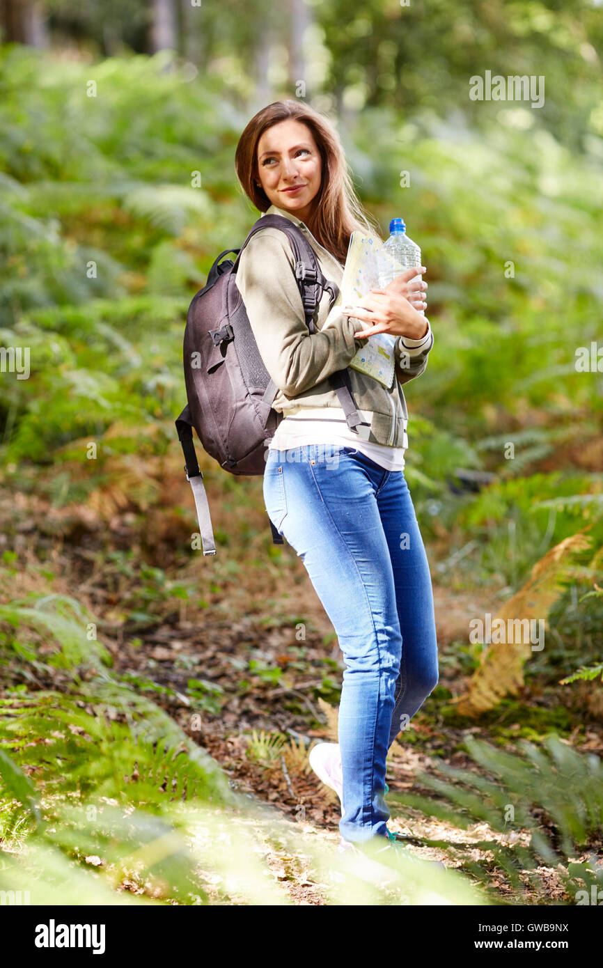 Woman walking in countryside Stock Photo