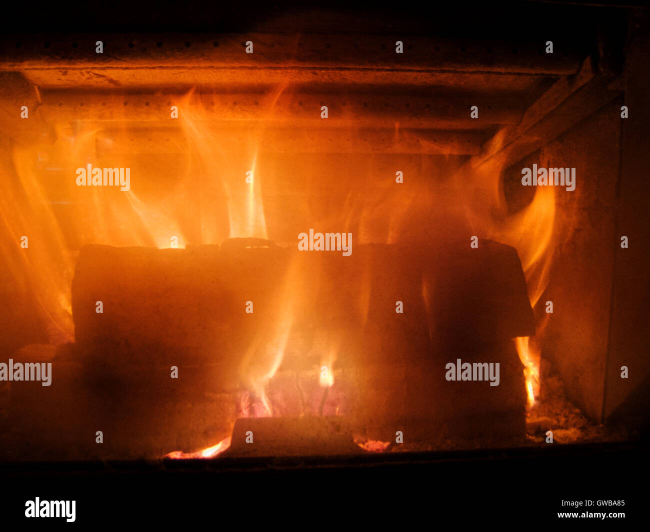 Close up of flames in wood burning stove Stock Photo Alamy