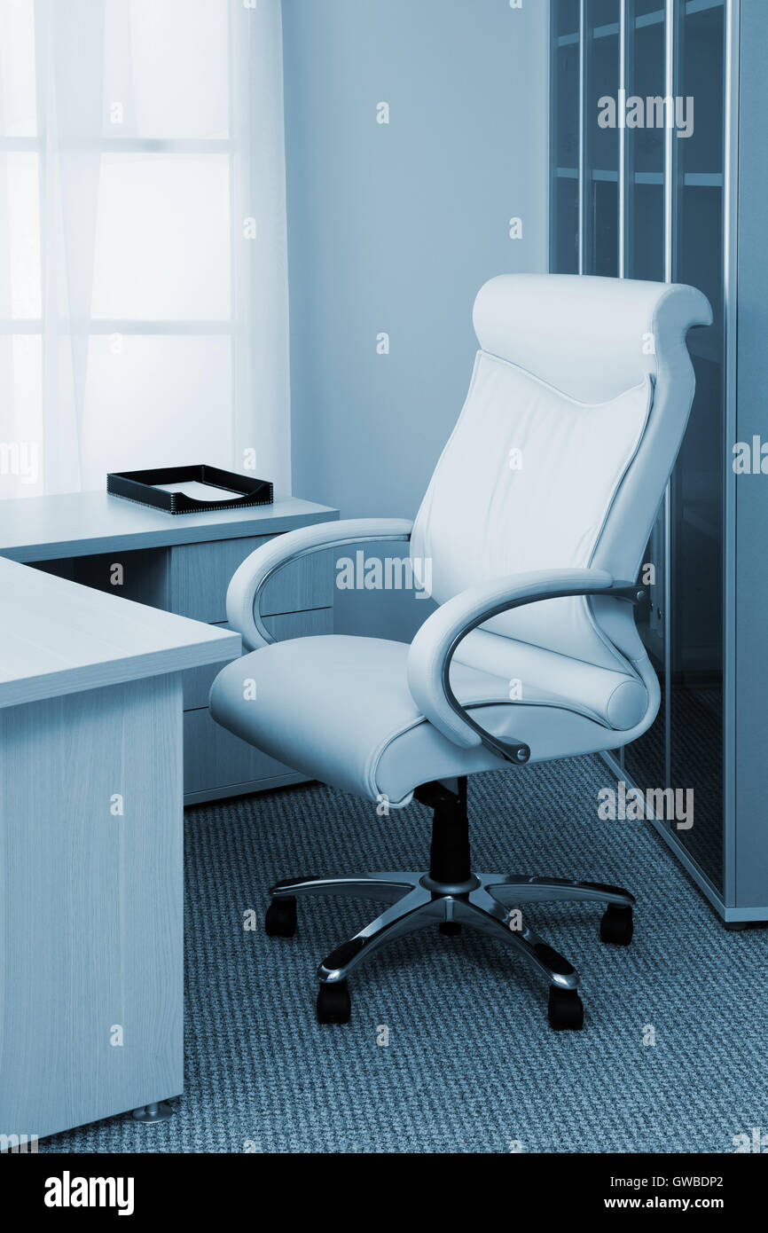 white leather armchair in a modern office Stock Photo Alamy