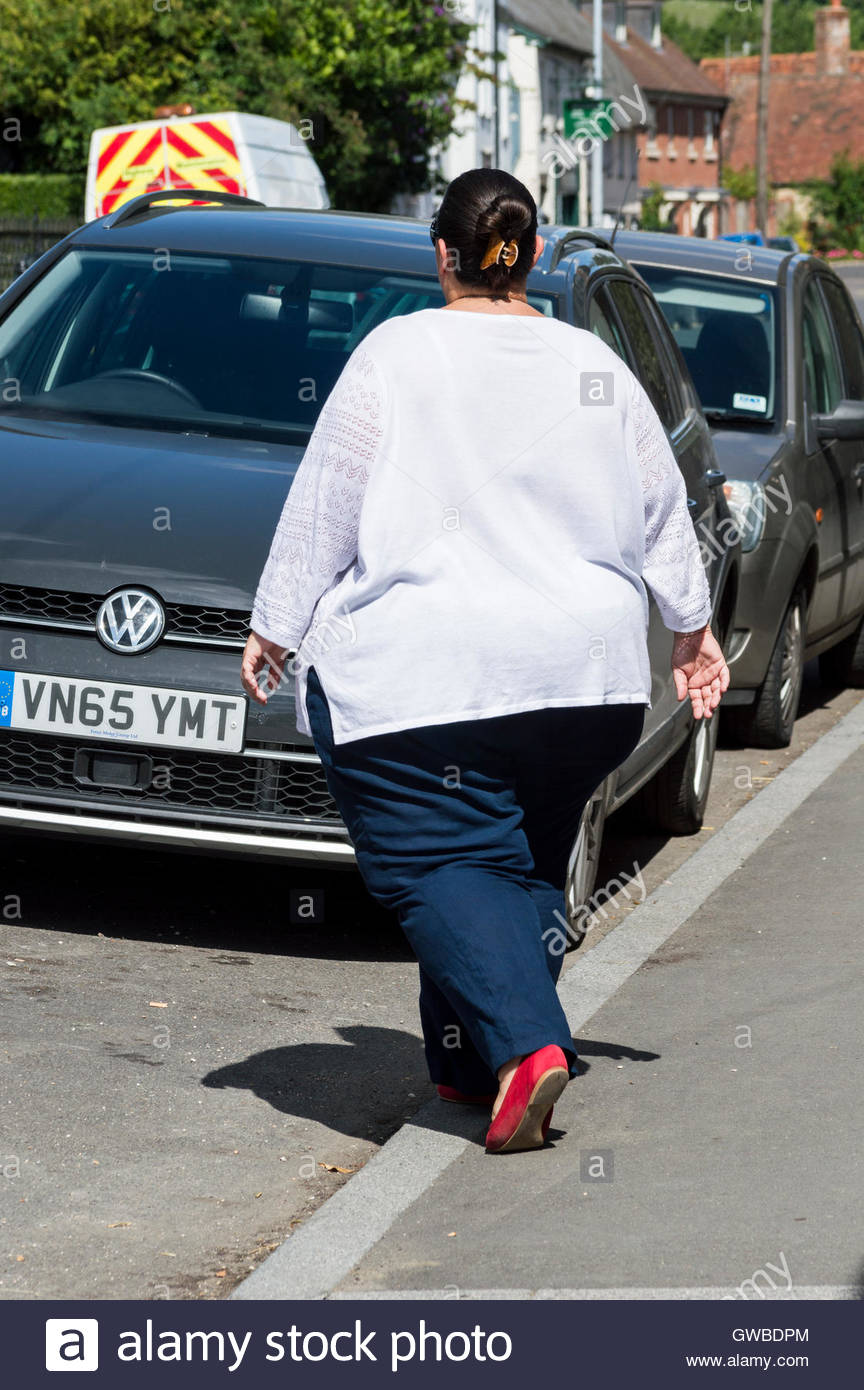 Overweight Woman Walking Stock Photos & Overweight Woman Walking Stock ...