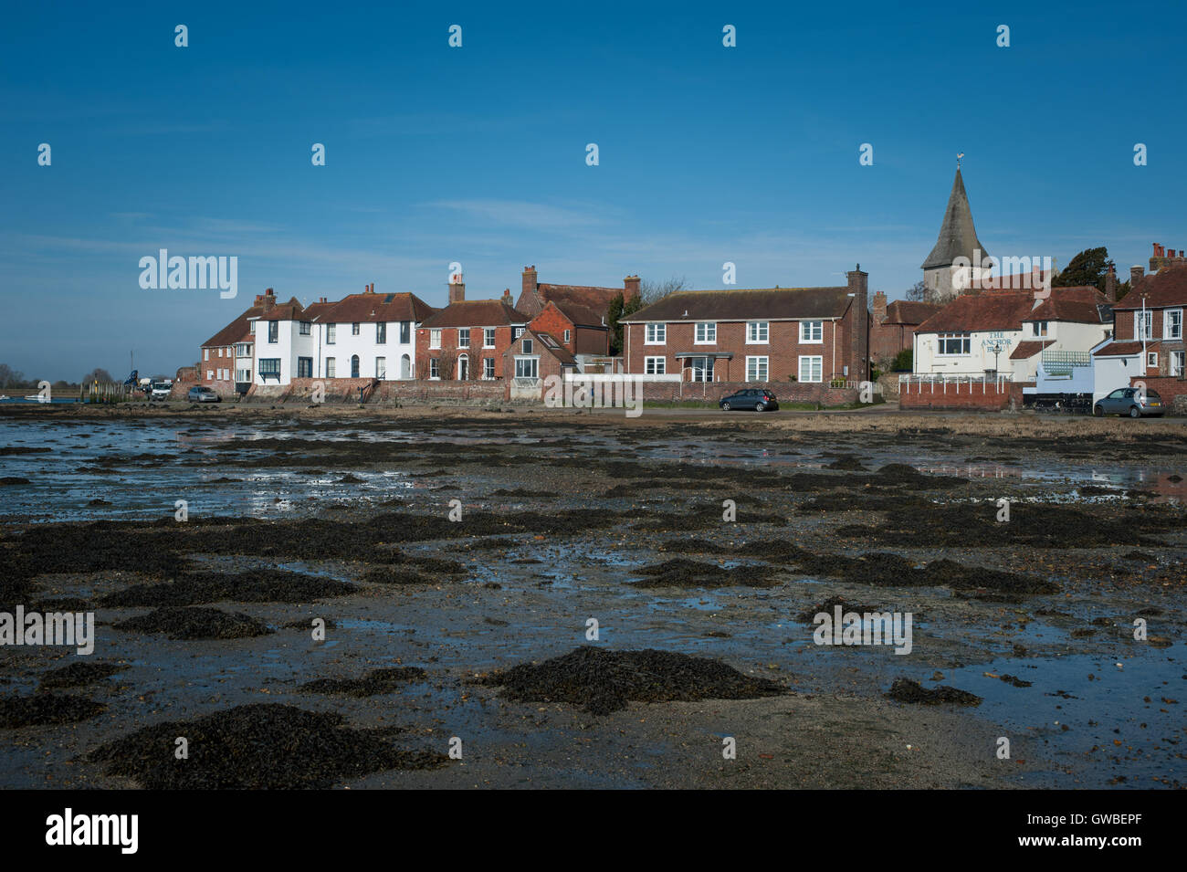 Bosham, West Sussex, UK. Homes on the water's edge overlooking an