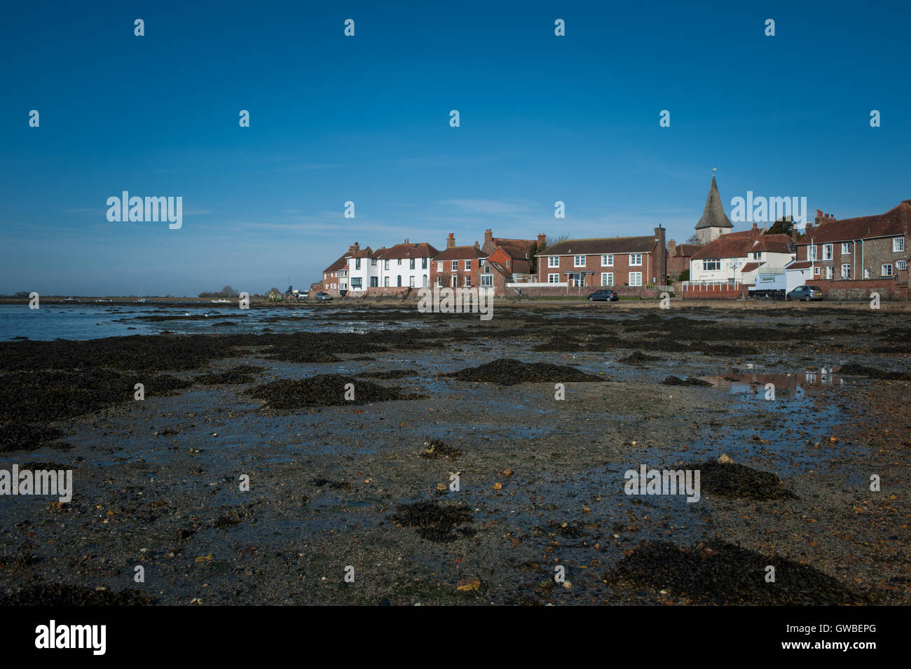 Bosham, West Sussex, UK. Homes on the water's edge overlooking an