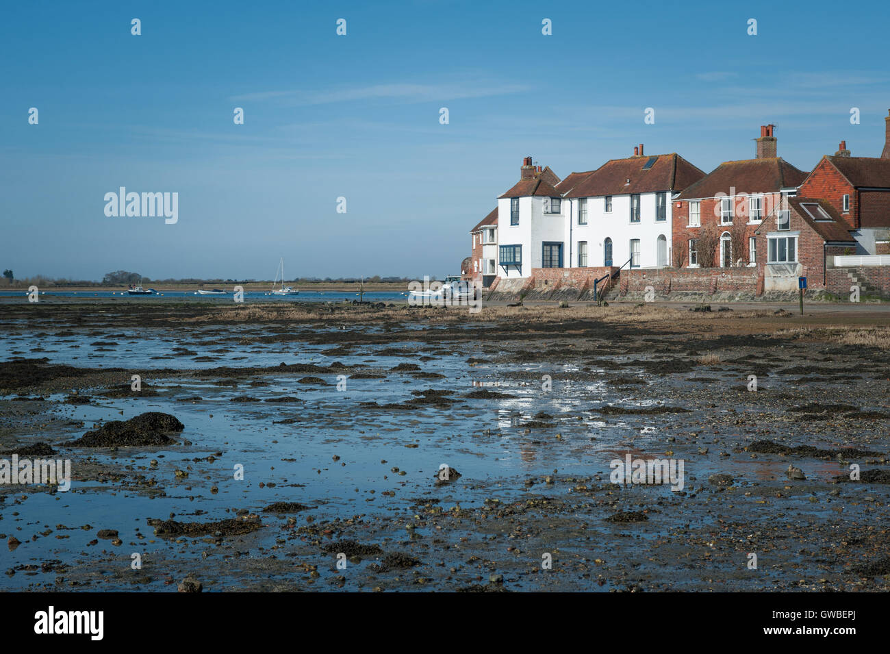 Bosham, West Sussex, UK. Homes on the water's edge overlooking an