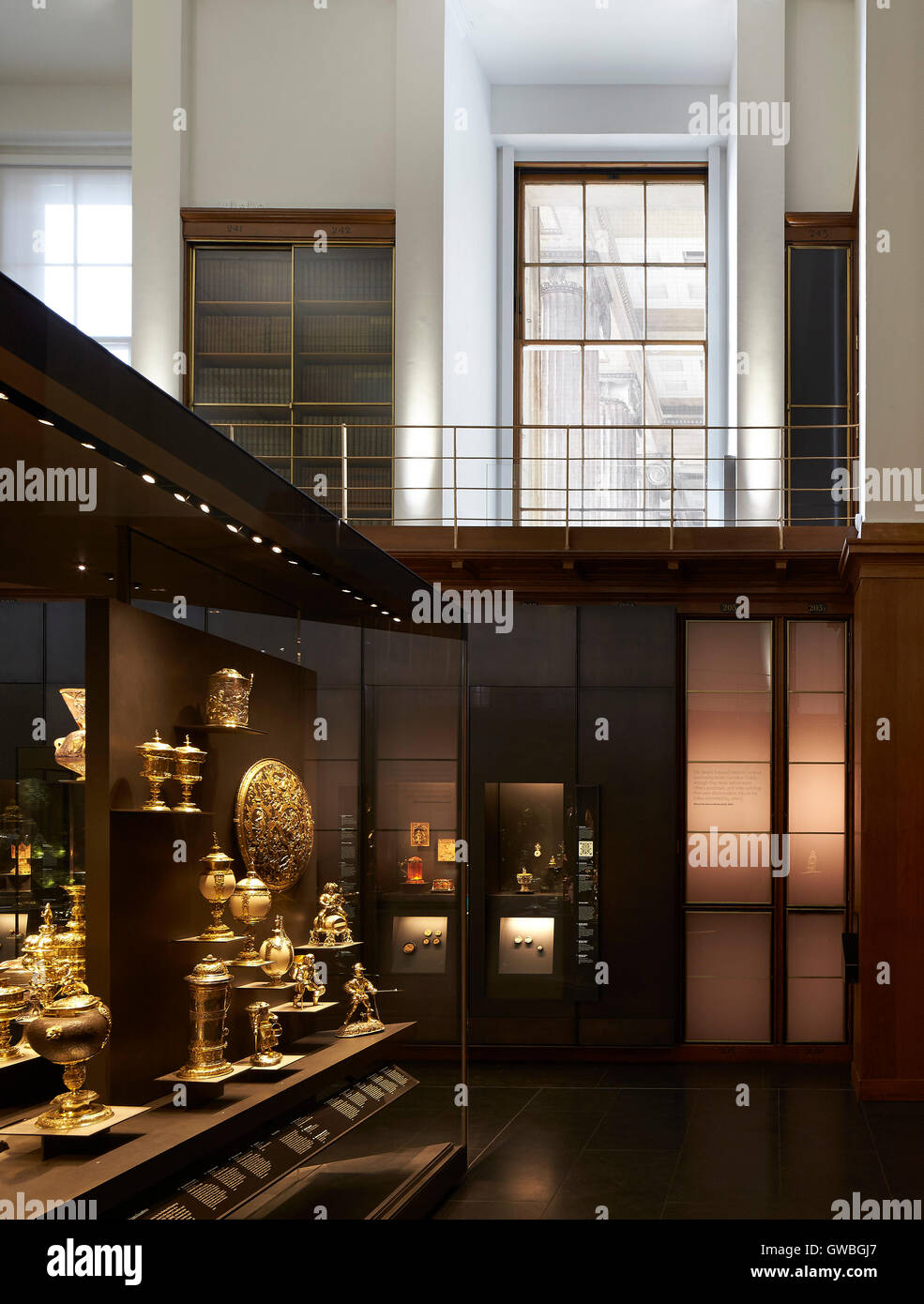 View along showcases within double-height gallery. Waddesdon Bequest Gallery at the British Museum, London, United Kingdom. Architect: Stanton Williams, 2015. Stock Photo
