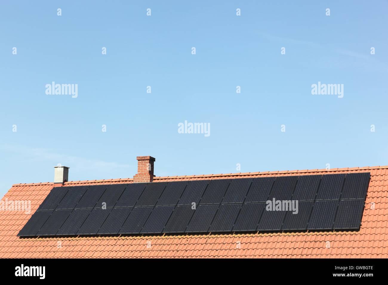 Solar panels on a roof Stock Photo