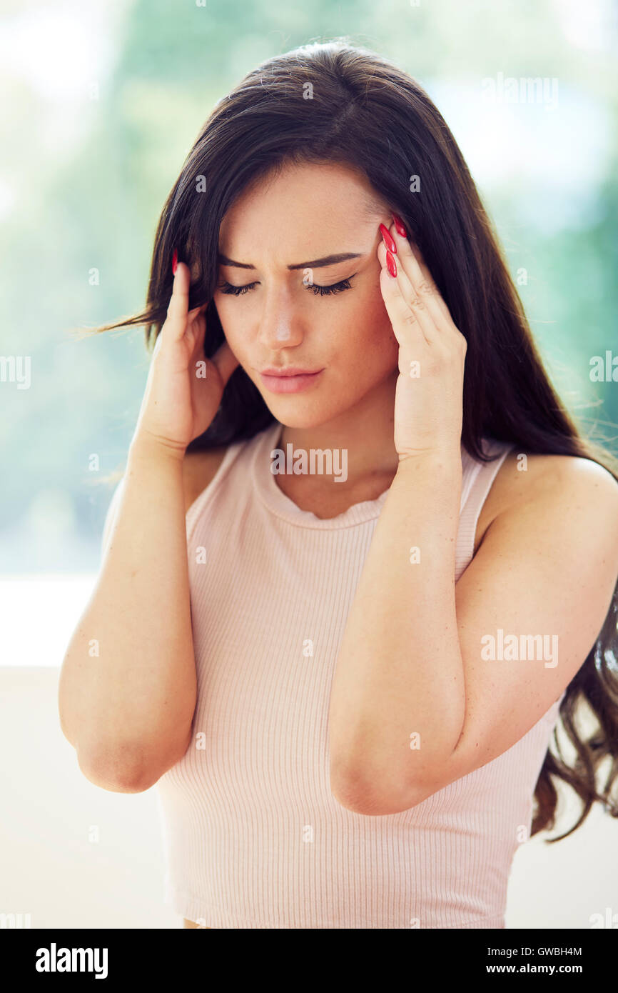 Woman with head ache Stock Photo