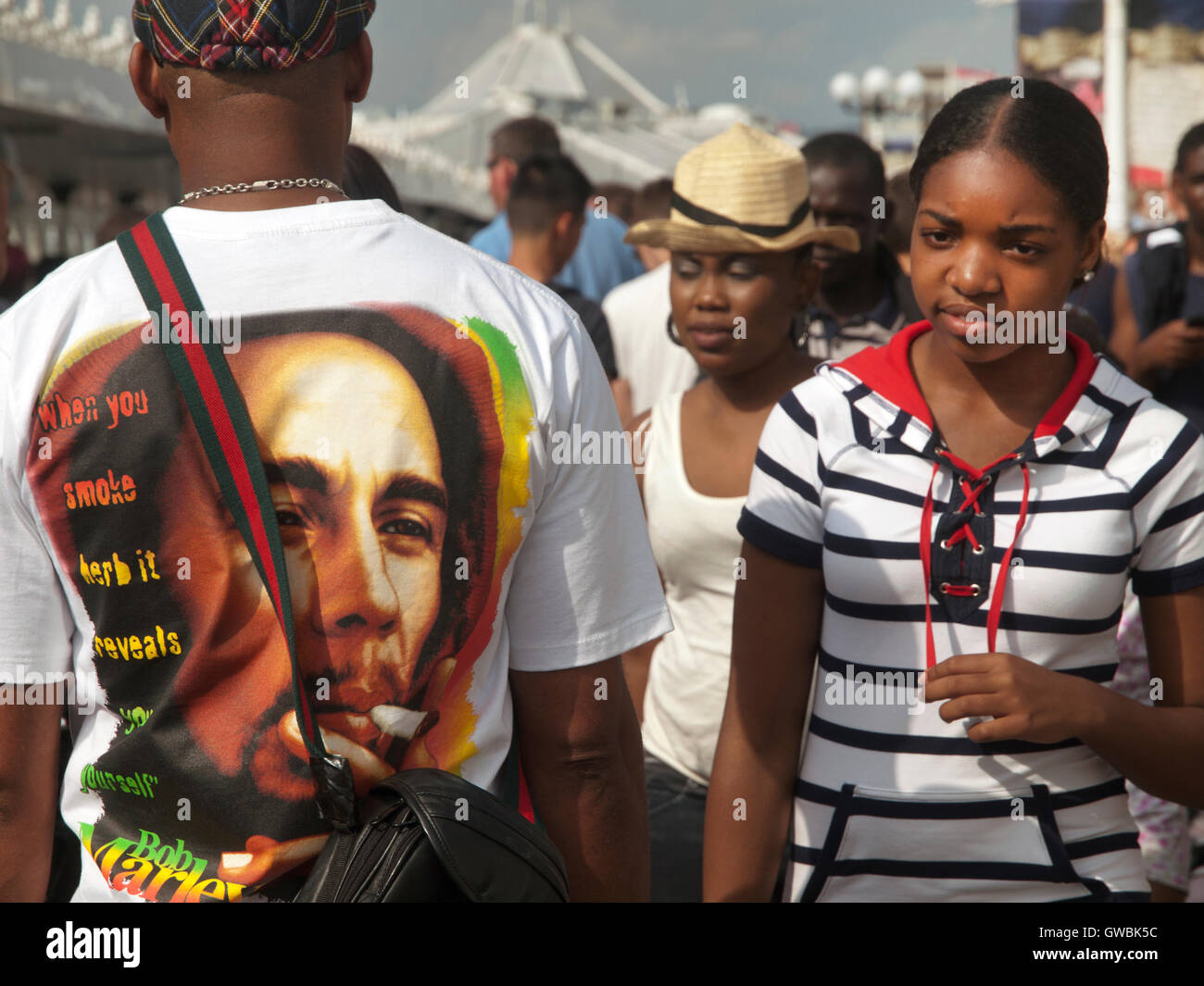 In Brighton a man wears a shirt with a picture of Bob Marley on it Stock Photo