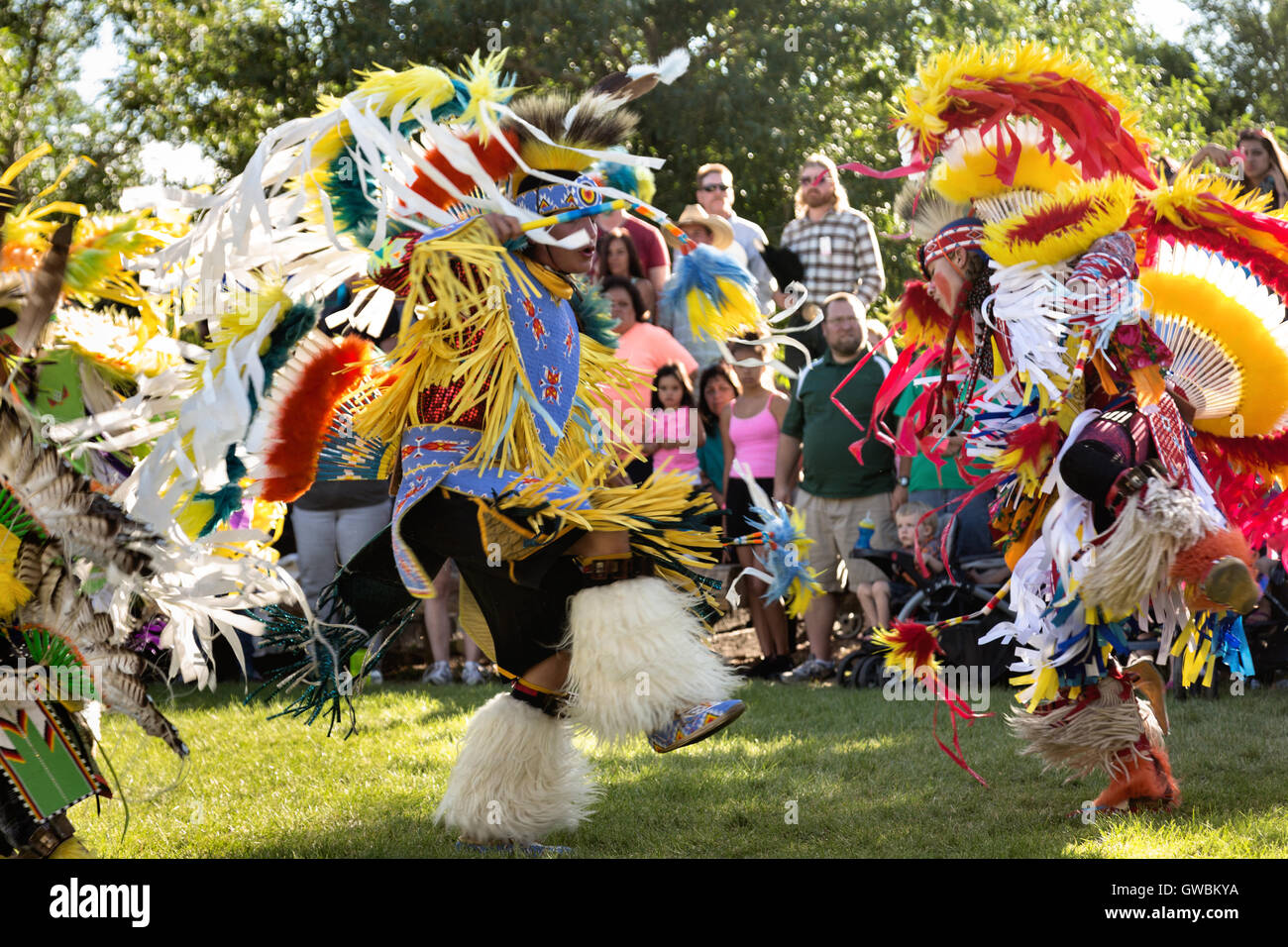Native American dancers from the Arapahoe people dressed in traditional