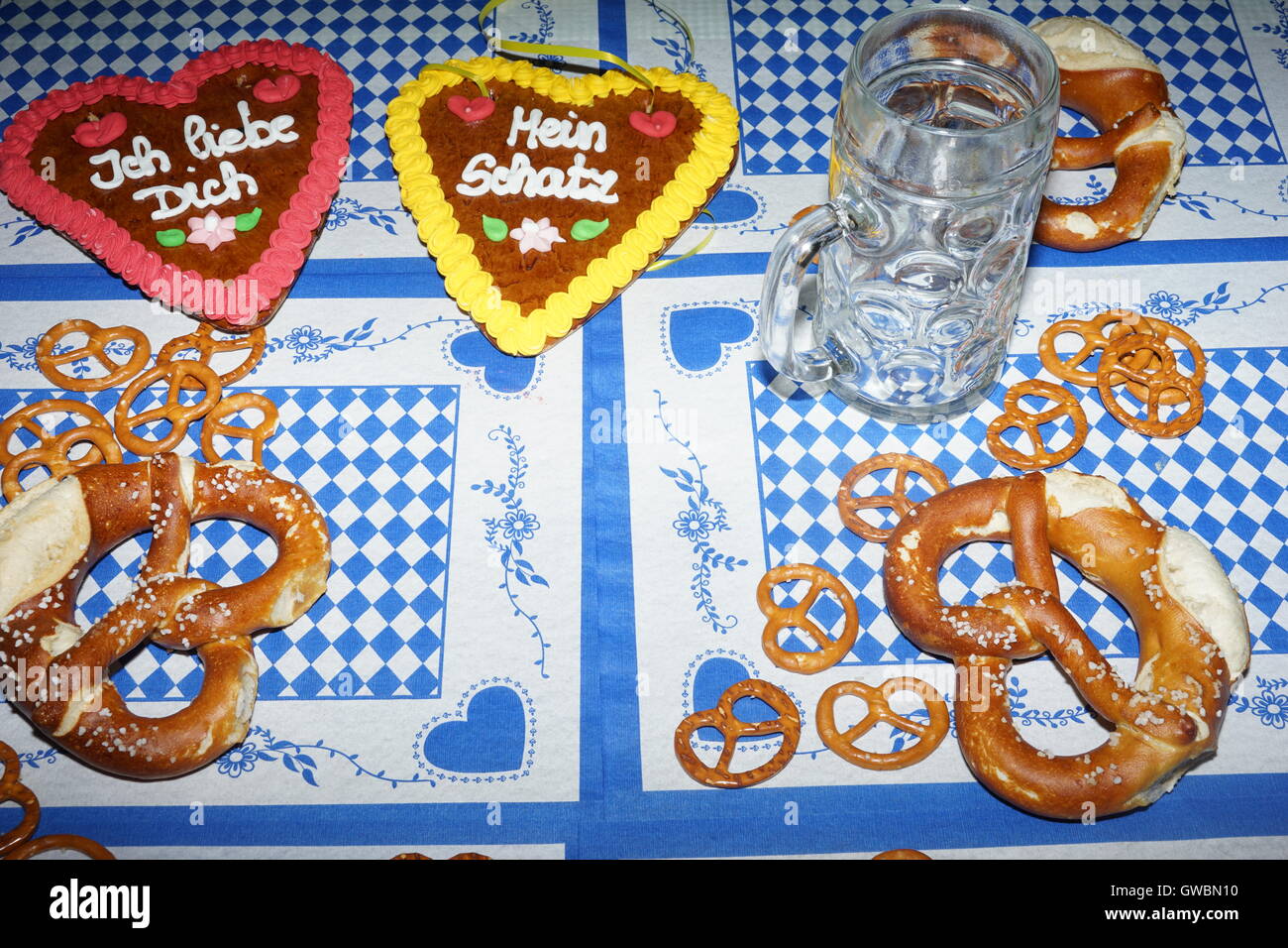 Bavarian meals for oktoberfest preparing on the bavarian national colours background Stock Photo