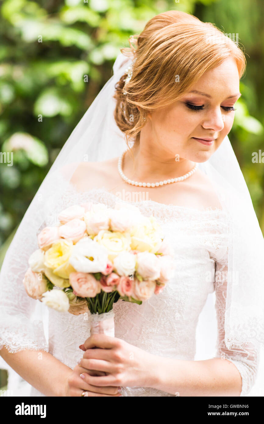 bride with bridal bouquet Stock Photo - Alamy