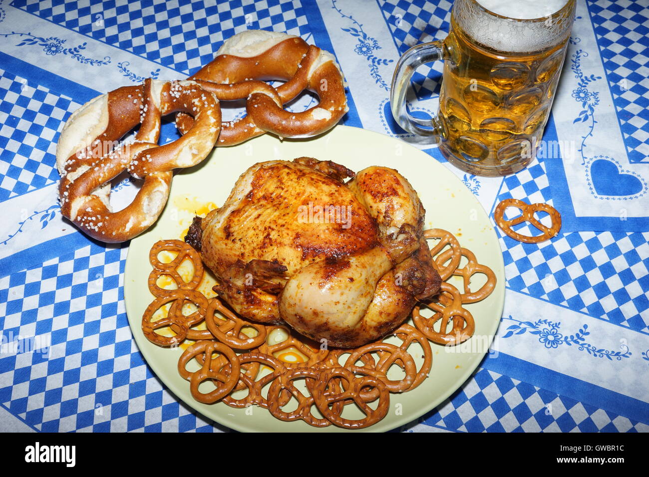 Bavarian meals for oktoberfest preparing on the bavarian national colours background Stock Photo