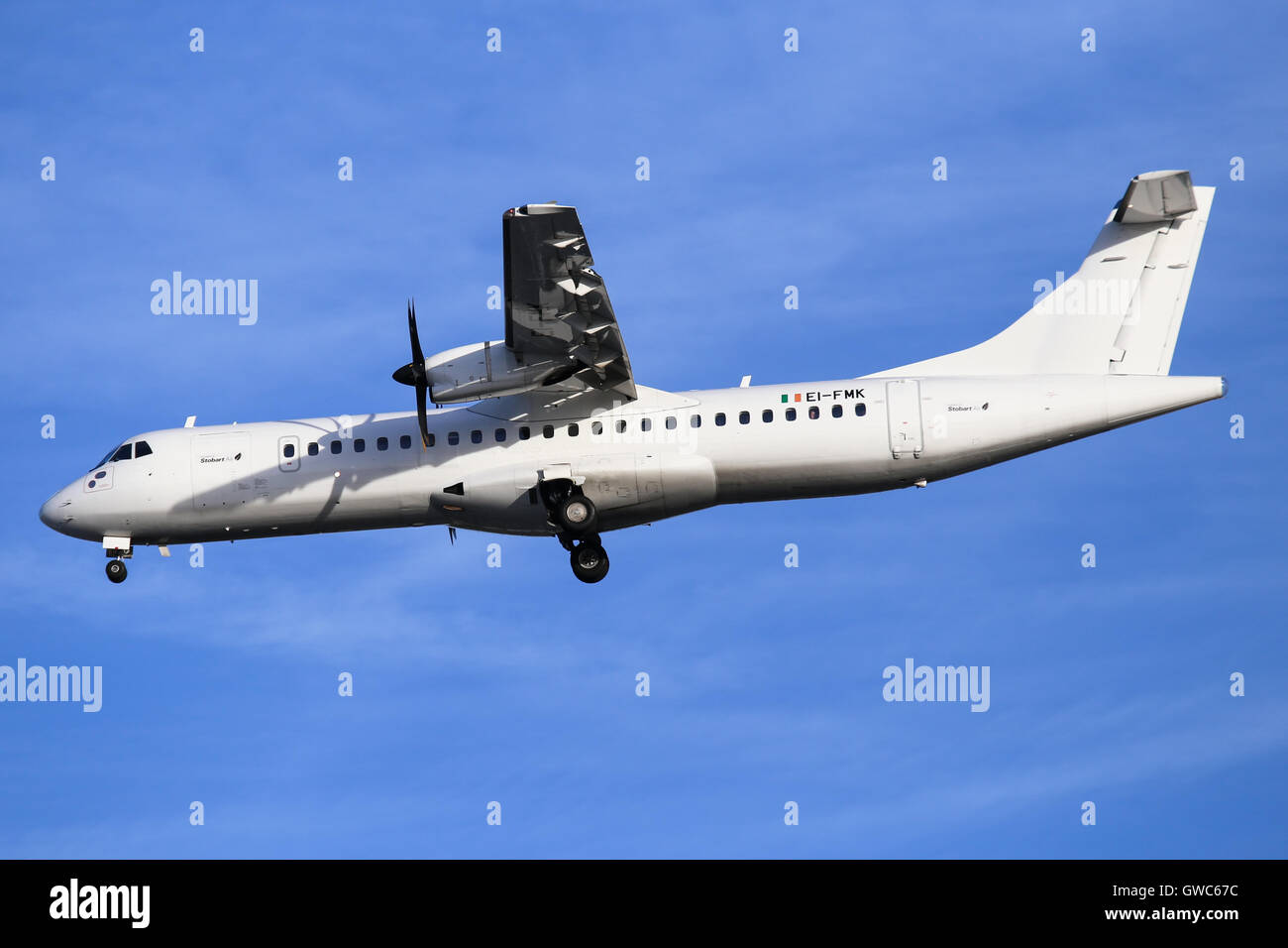 Stobart Air ATR72 approaches  runway 23R at Manchester airport. Stock Photo