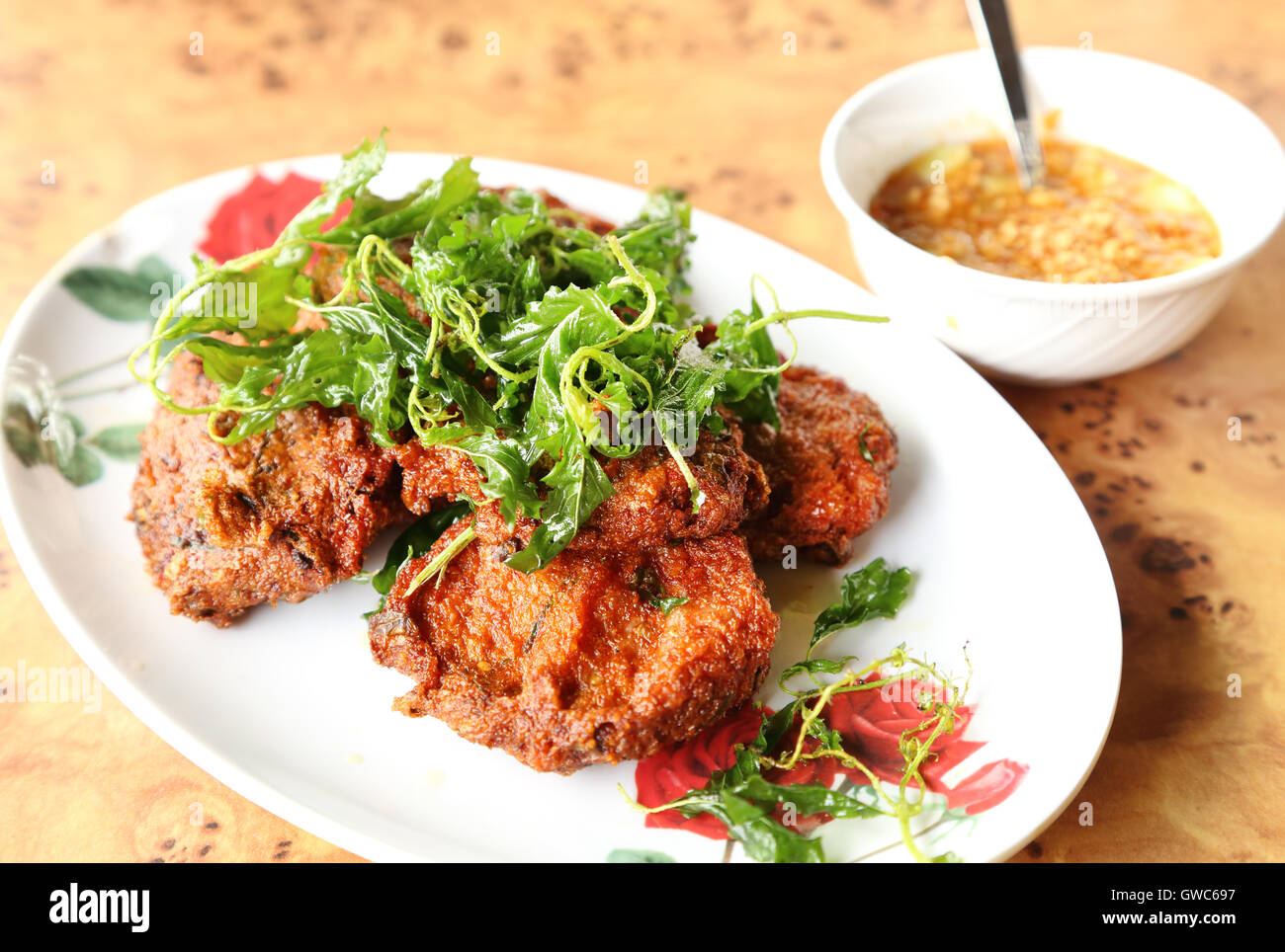 Deepfried curried fish patties Stock Photo Alamy