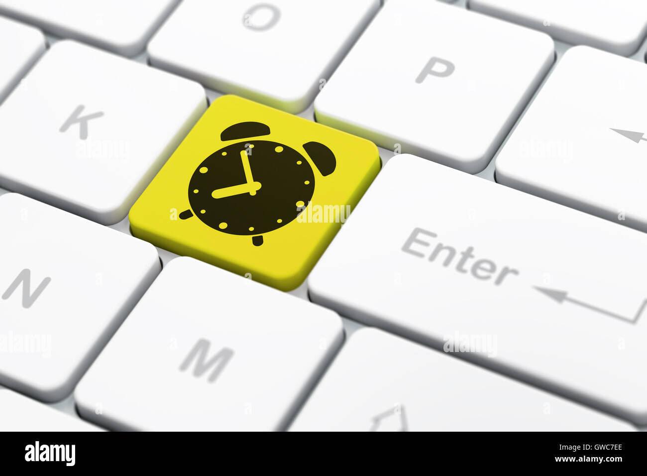 Time concept Alarm Clock on computer keyboard background Stock Photo