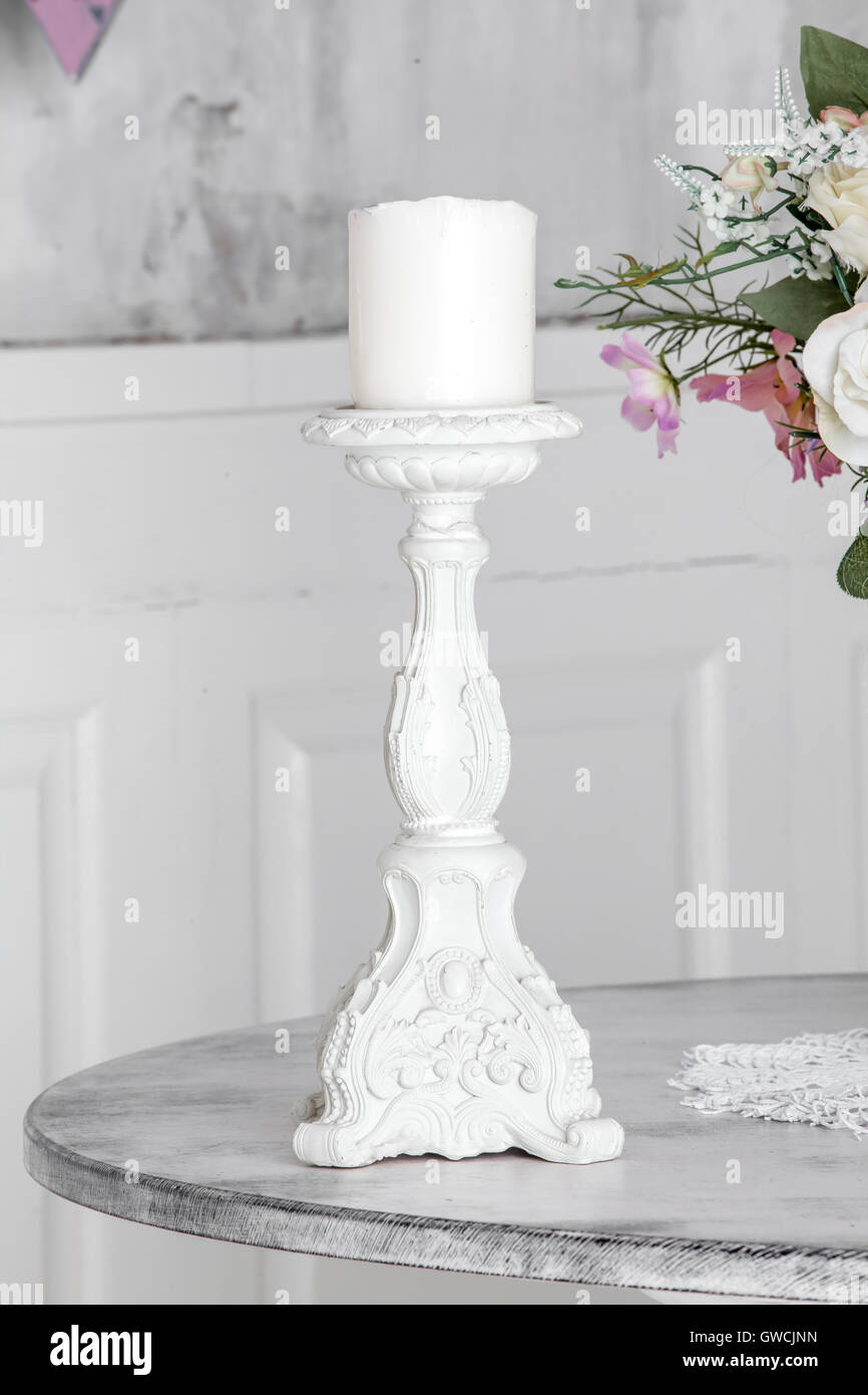 White candle holder Stock Photo Alamy