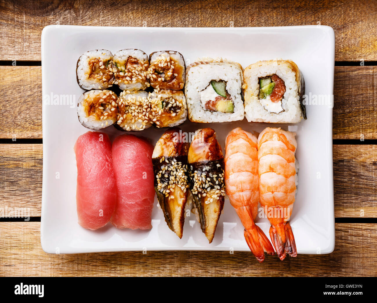 Sushi Set nigiri and rolls on wooden background Stock Photo