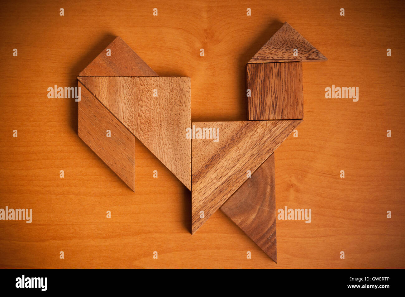 Tangram figure rooster Stock Photo