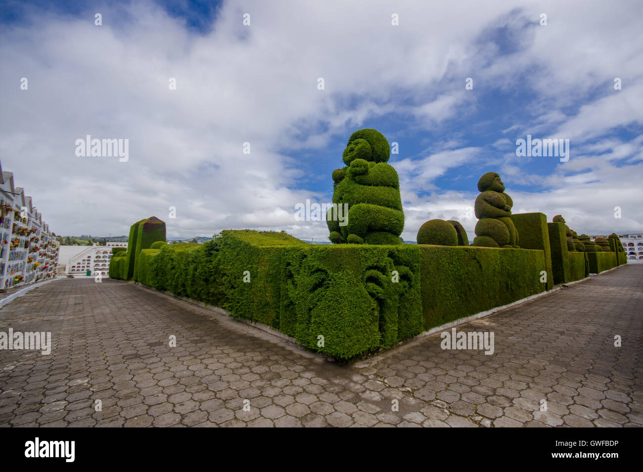 TULCAN, ECUADOR - JULY 3, 2016: some sculptures of the topiary have human prehispanic shapes Stock Photo