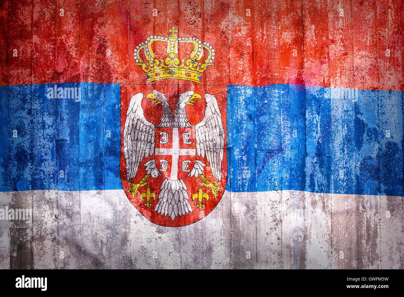 Grunge style of Serbia flag on a brick wall for background Stock Photo