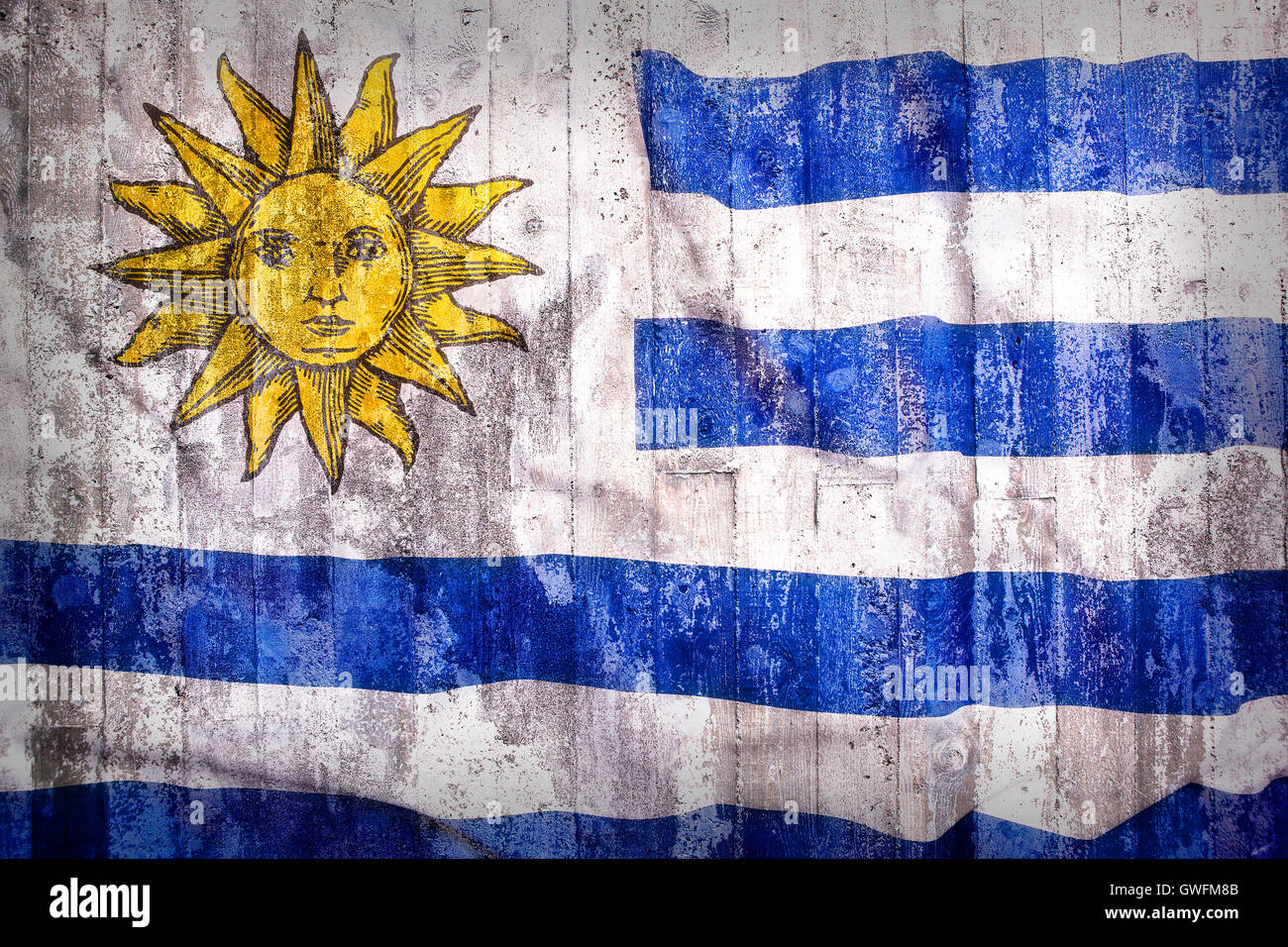 Grunge style of Uruguay flag on a brick wall for background Stock Photo