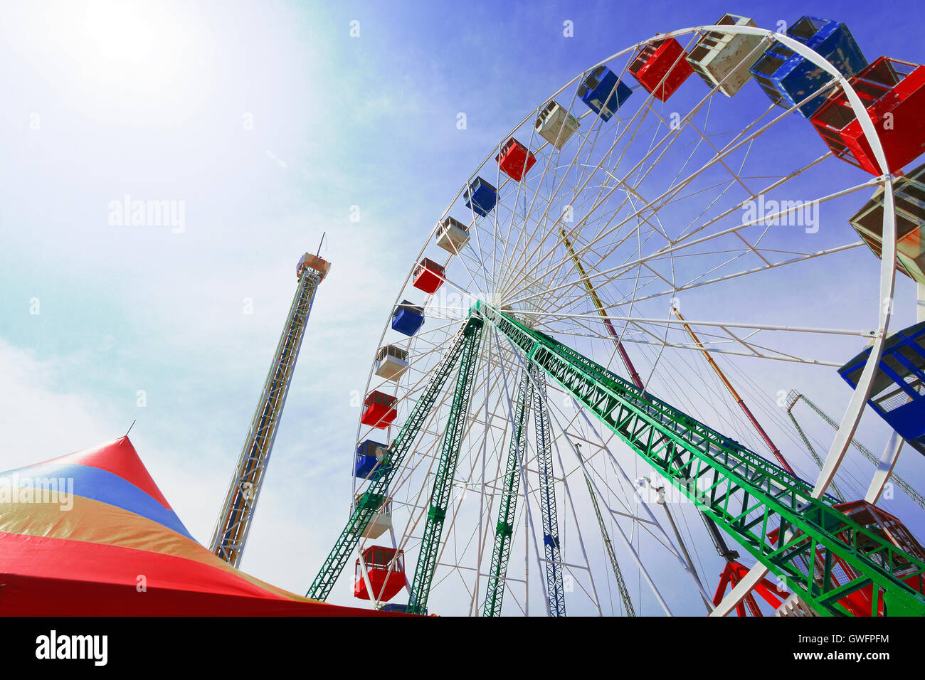 Colorful amusement park ride Stock Photo - Alamy