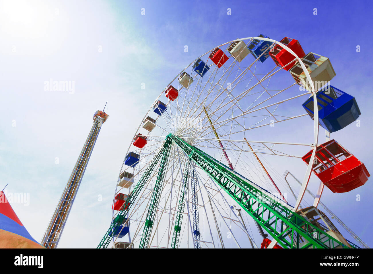 Colorful amusement park ride Stock Photo - Alamy