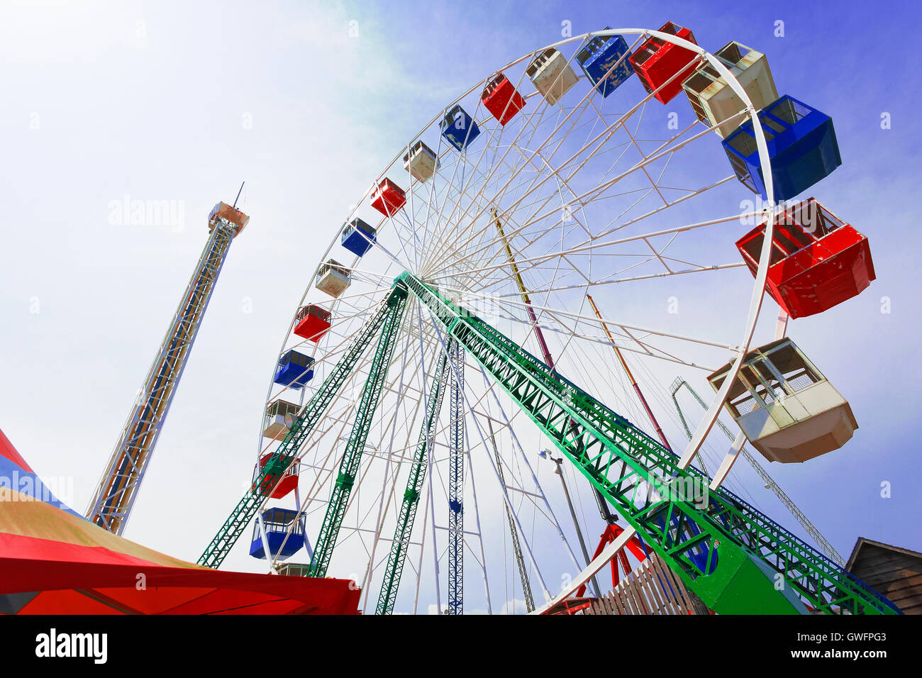Colorful amusement park ride Stock Photo - Alamy