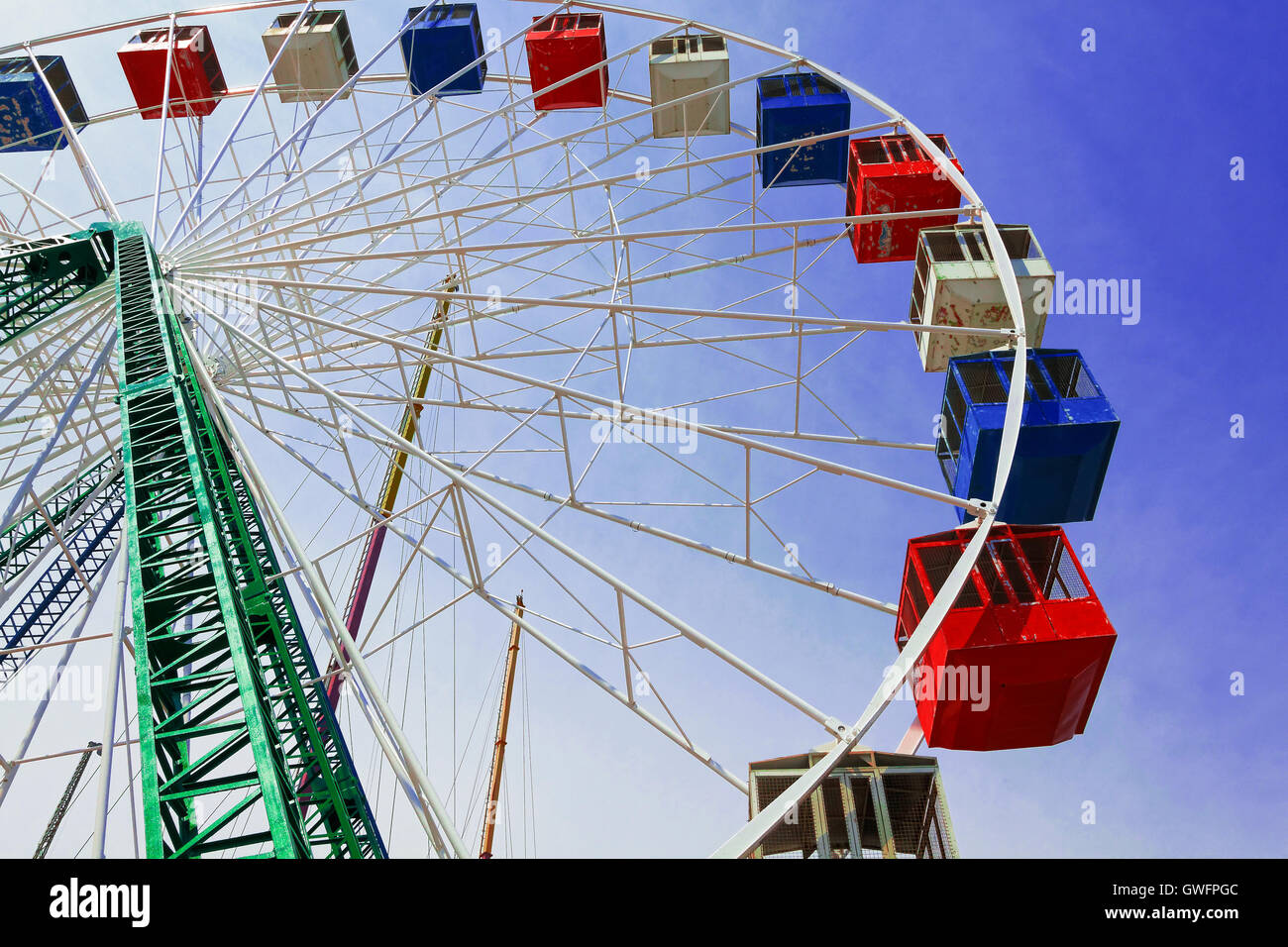 Colorful amusement park ride Stock Photo - Alamy