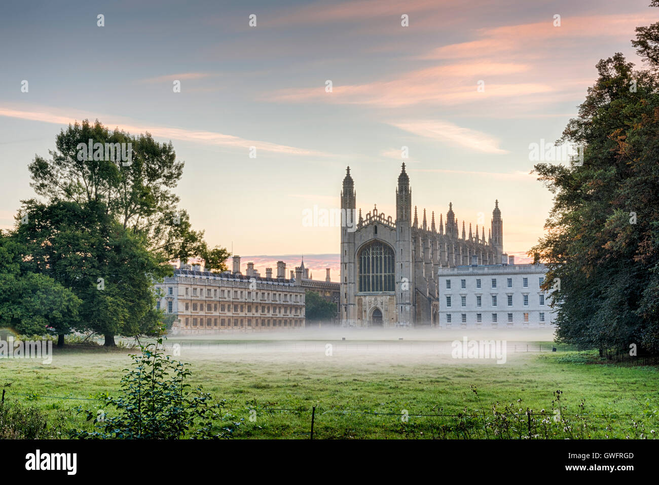 King’s College, Cambridge, UK, 13th September 2016. Mist hangs in the air and across the manicured lawns of King’s College Cambridge UK at dawn on one of the hottest September days in the UK on record. Temperatures across the south east of England are forecast to reach over 30 degrees centigrade in an early autumn heatwave. Credit: Julian Eales/Alamy Live News Stock Photo