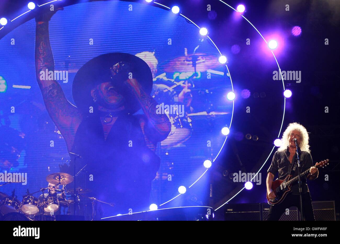 (160913) -- TEL AVIV, Sept. 13, 2016(Xinhua) -- Brian May (R) performs during the performance of Queen   Adam Lambert at Hayarkon Park in Tel Aviv, Israel, Sept. 12, 2016. (Xinhua/Gil Cohen Magen) (sxk) Stock Photo