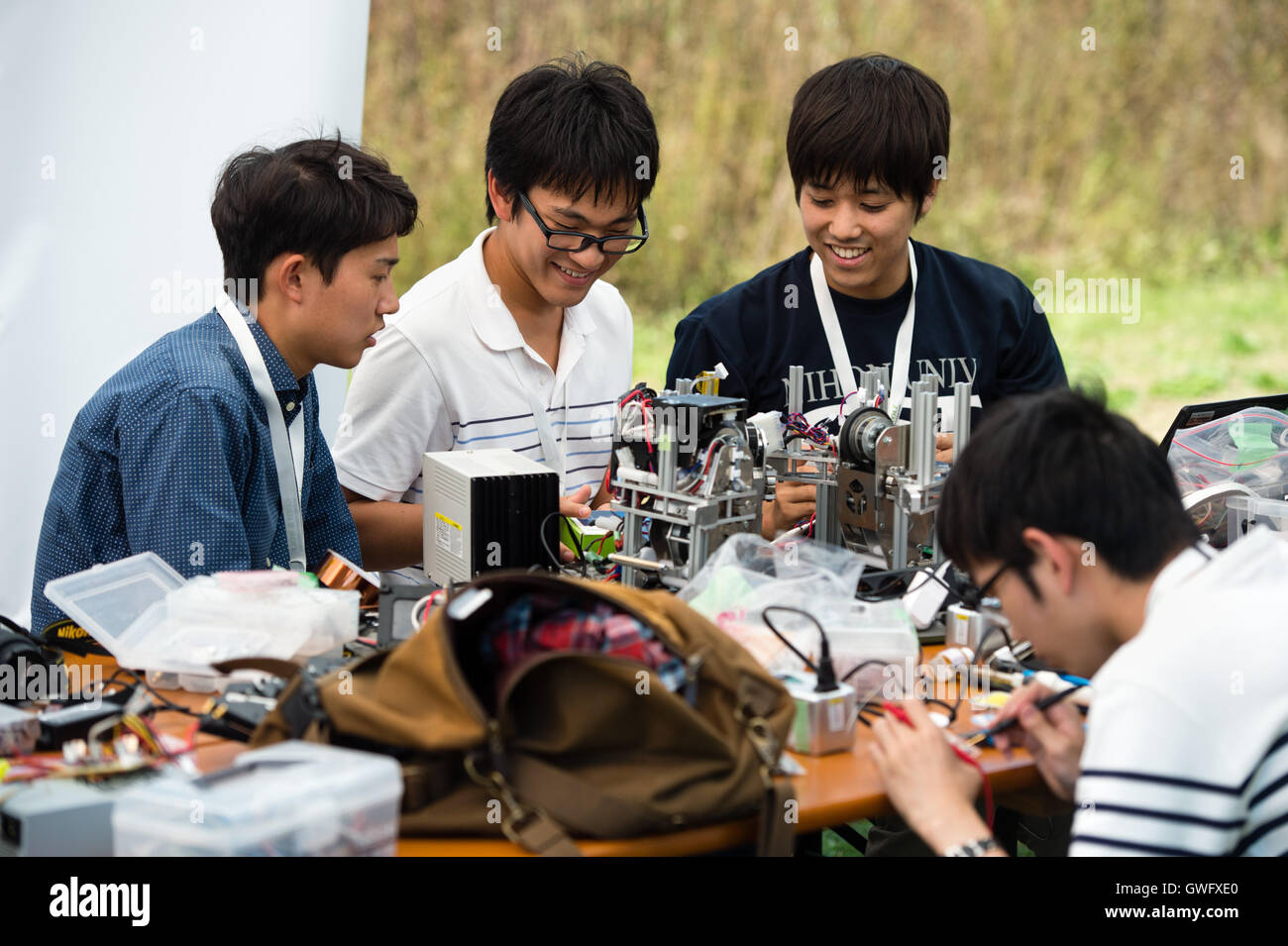 Garching, Germany. 13th Sep, 2016. Kenya Otsuka (l-r), Daichi Murakami and Jun Maeda of team 'Tryforce' from Japan at work during the European Space Elevator Challenge on the campus of the Munich Technical University in Garching, Germany, 13 September 2016. For the competition, the teams have developed small 'space elevators', which have to travel 100 metres along a rope up to a balloon. PHOTO: MATTHIAS BALK/DPA/Alamy Live News Stock Photo