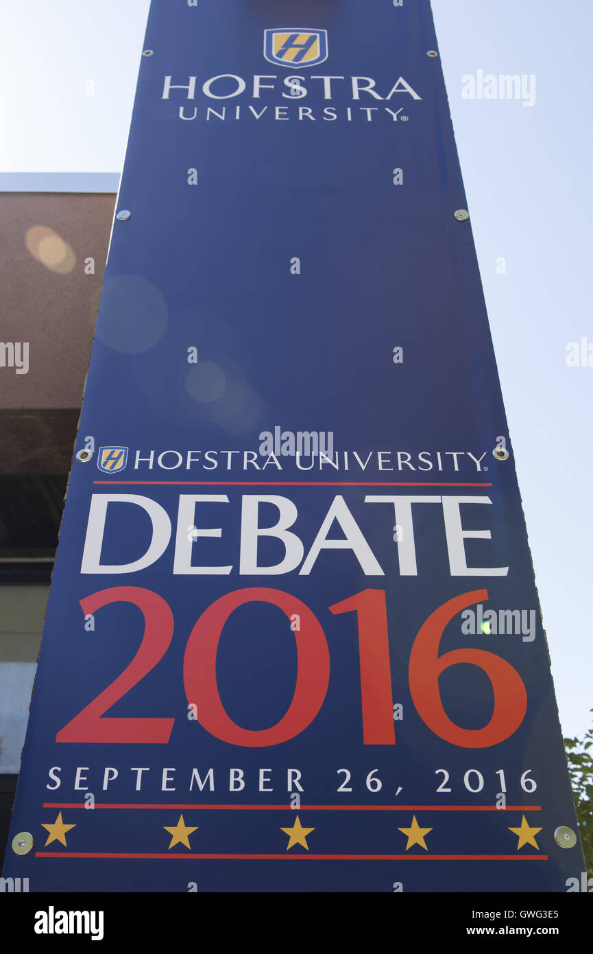 Hempstead, New York, USA. 13th Sep, 2016. Hofstra University Debate 2016 banner, tall vertical in patriotic red white and blue, is one of many displayed on the campus of Hofstra University, which will host the first Presidential Debate, between H.R. Clinton and D. J. Trump, scheduled for later that month on September 26. Hofstra is first university ever selected for 3 consecutive U.S. presidential debates. © Ann Parry/ZUMA Wire/Alamy Live News Stock Photo